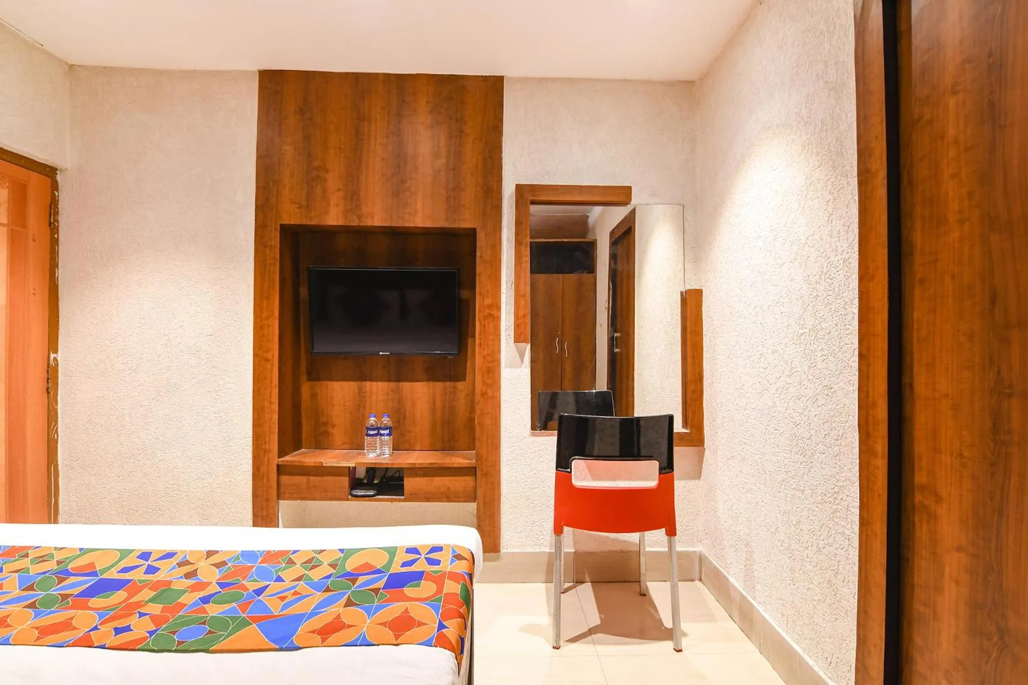 Bed in FabHotel Marina