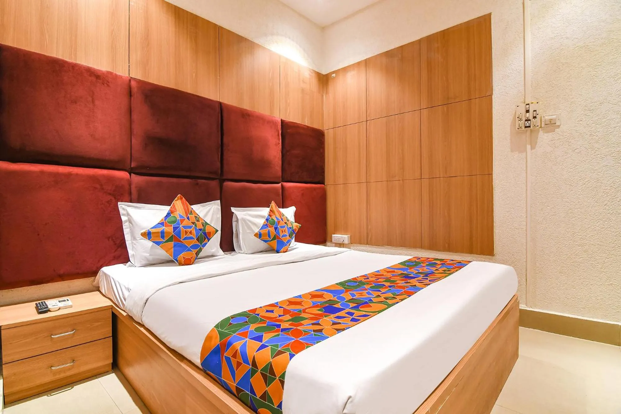 Bed in FabHotel Marina