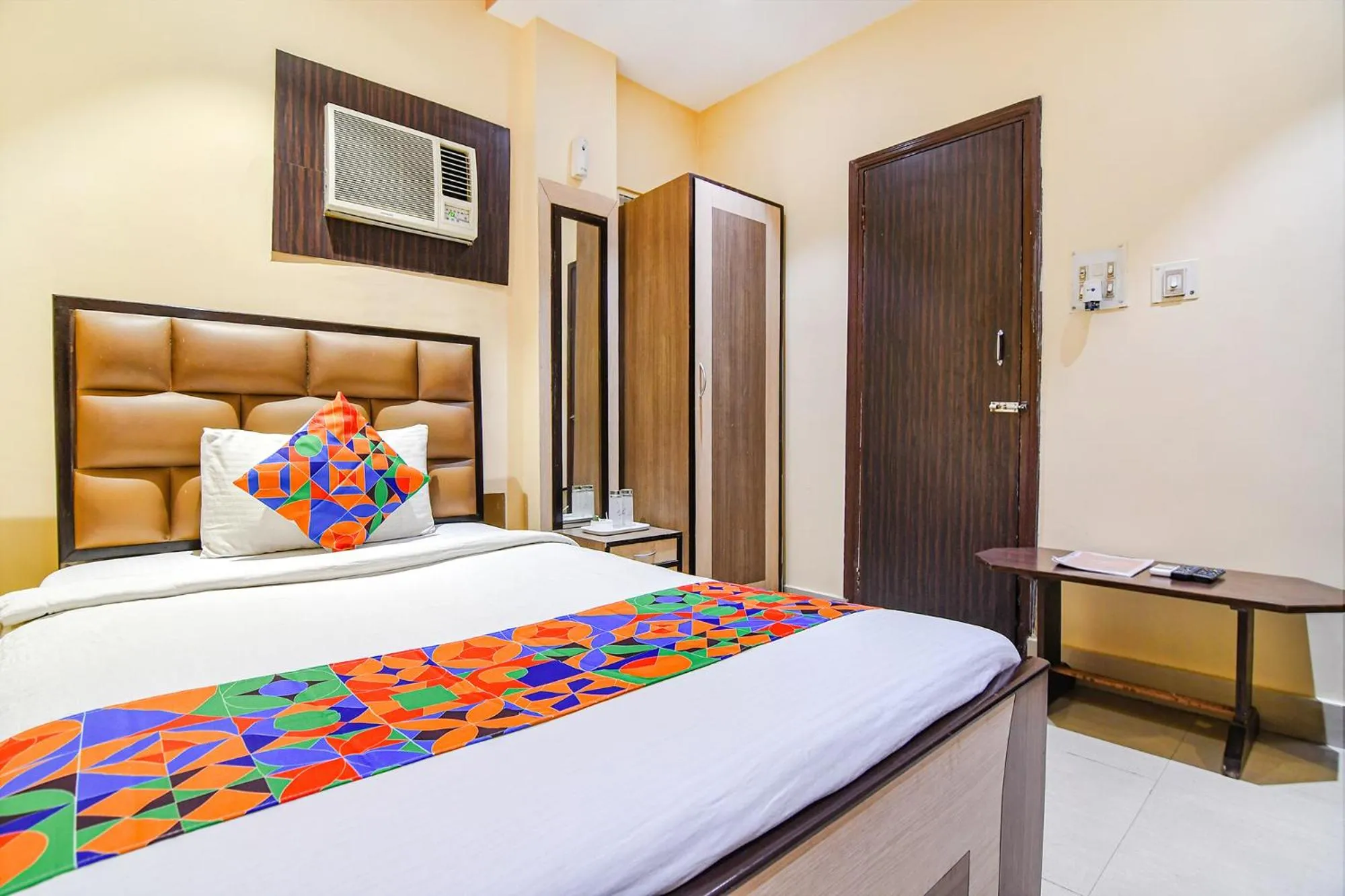 Bed in FabHotel Aayash - Nr City Center Metro Station