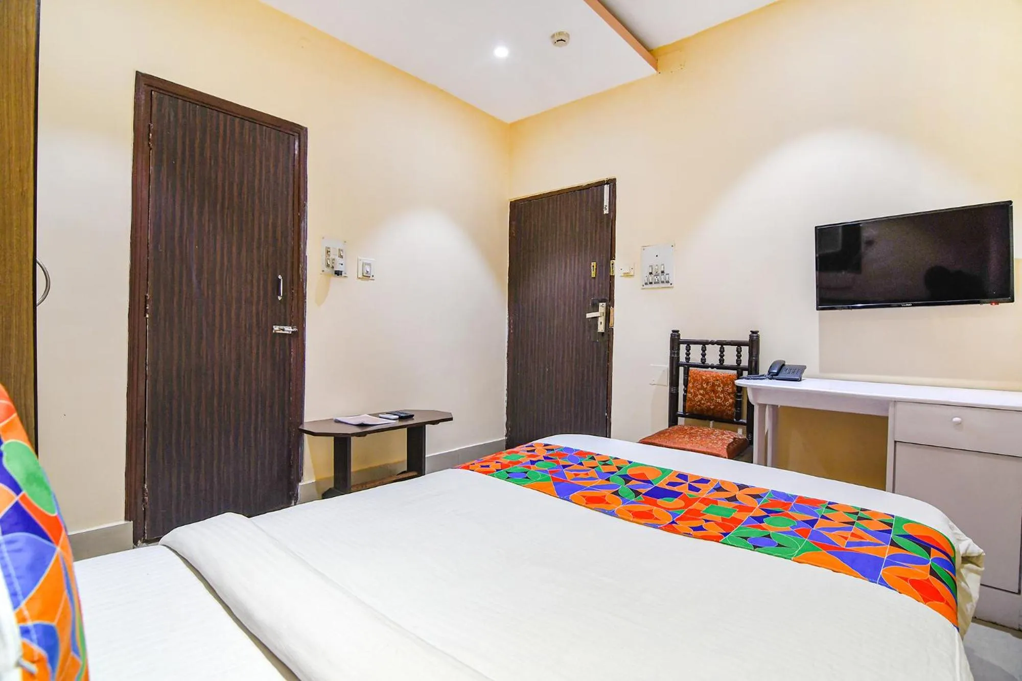 Bed in FabHotel Aayash - Nr City Center Metro Station