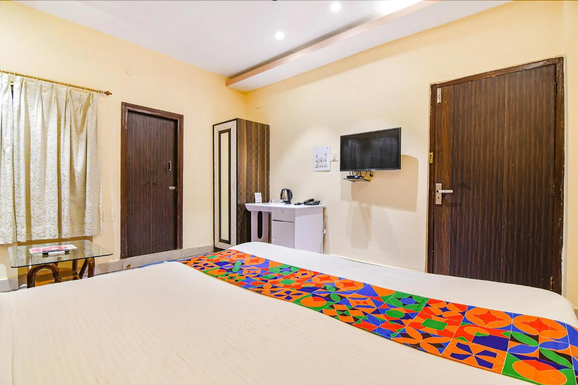 Bed in FabHotel Aayash - Nr City Center Metro Station