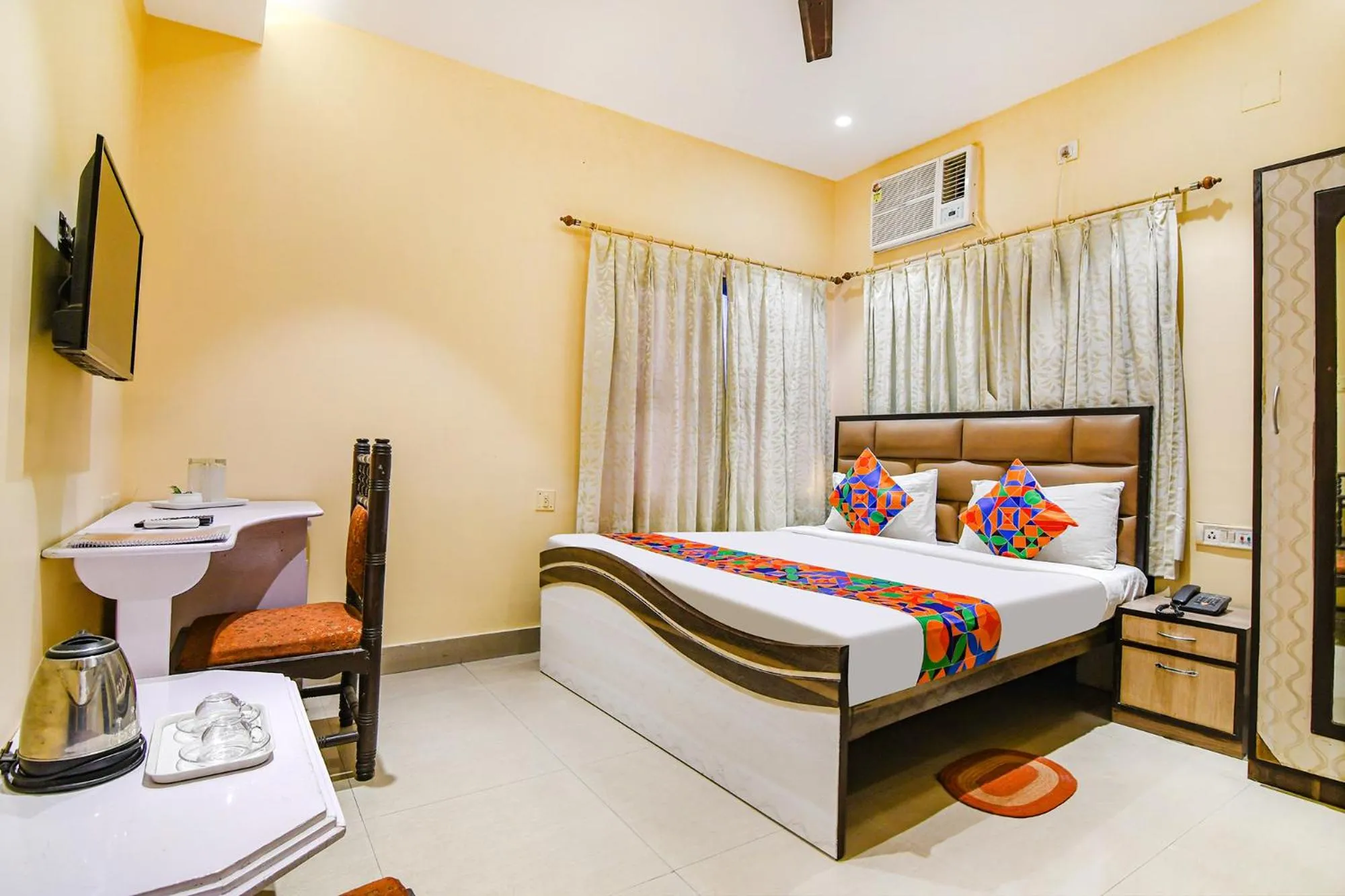 Bed in FabHotel Aayash - Nr City Center Metro Station