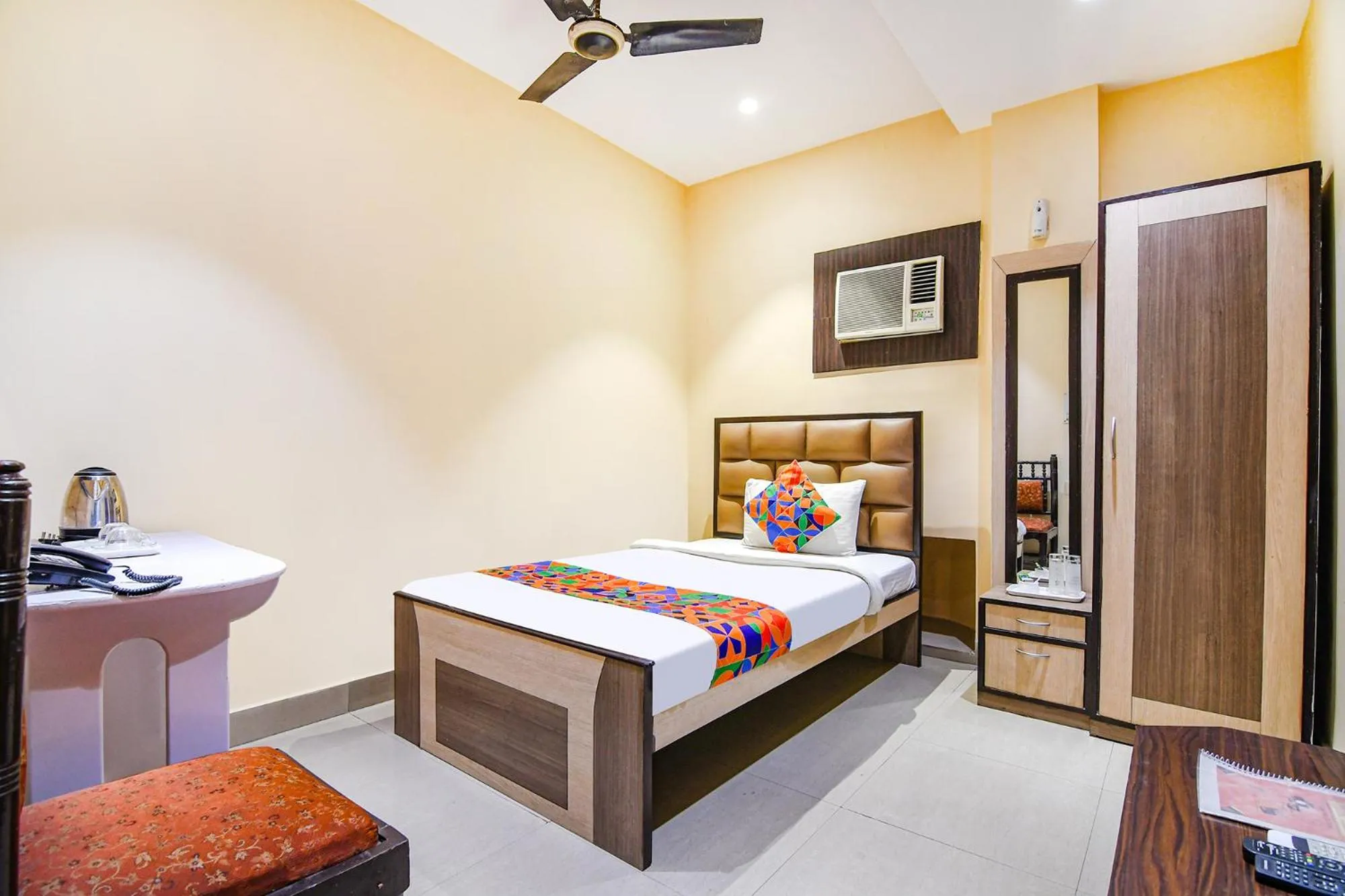 Bed in FabHotel Aayash - Nr City Center Metro Station