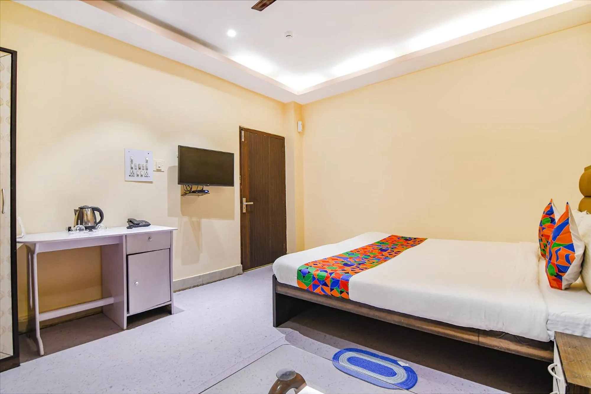Bed in FabHotel Aayash - Nr City Center Metro Station