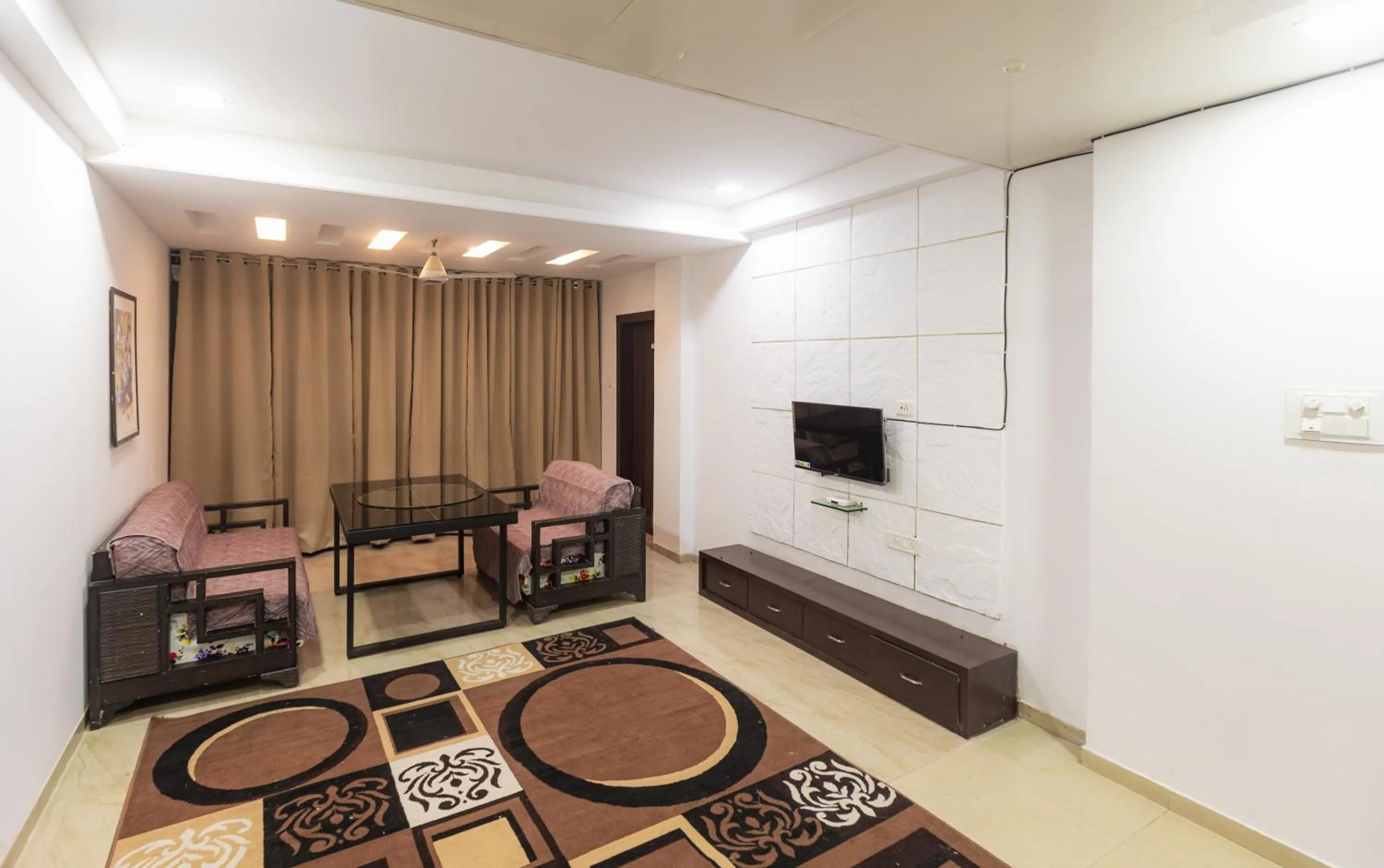 Seating area in Treebo Shembekars Inn