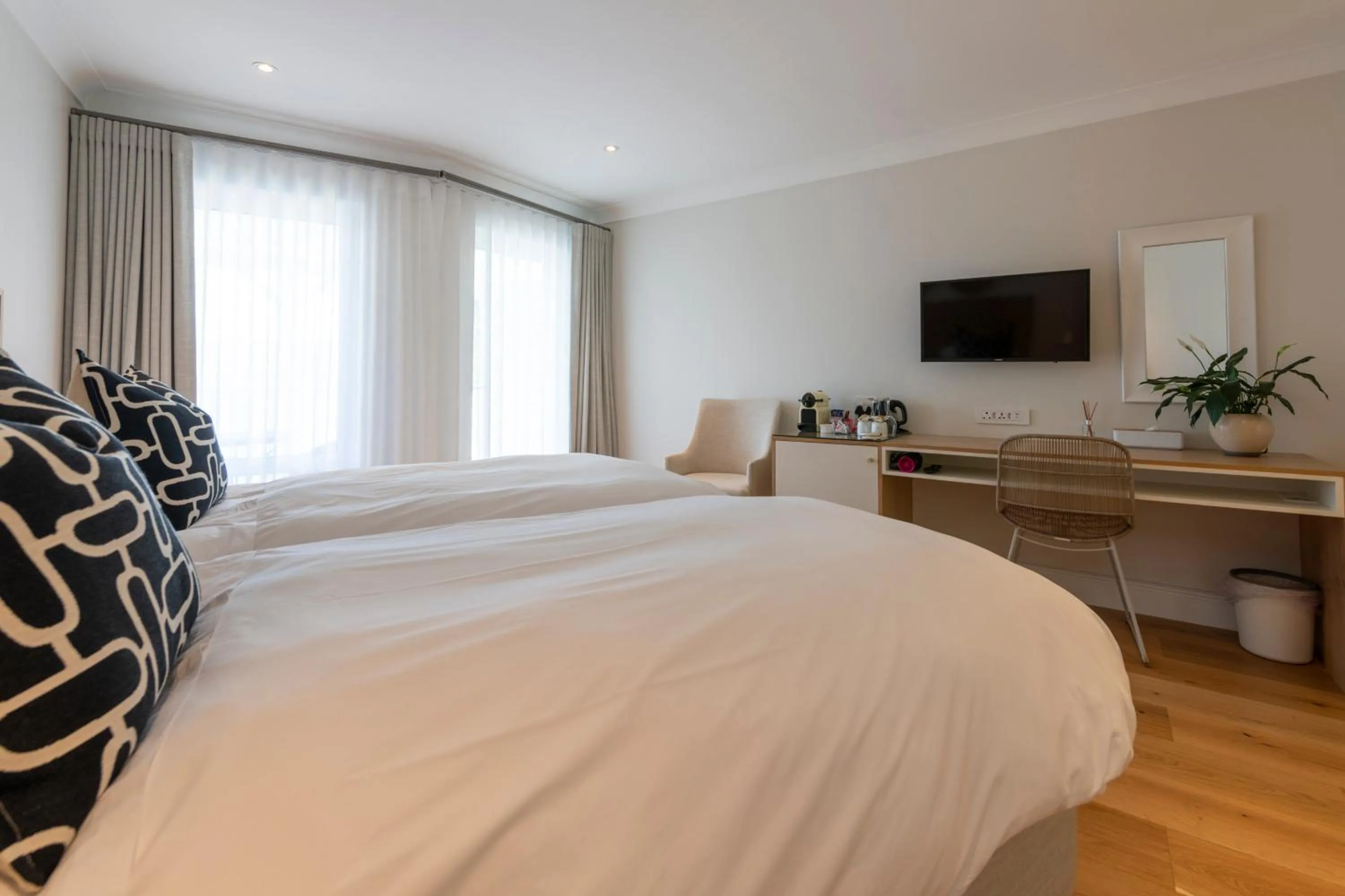 Bed in Hide-Away Guest House