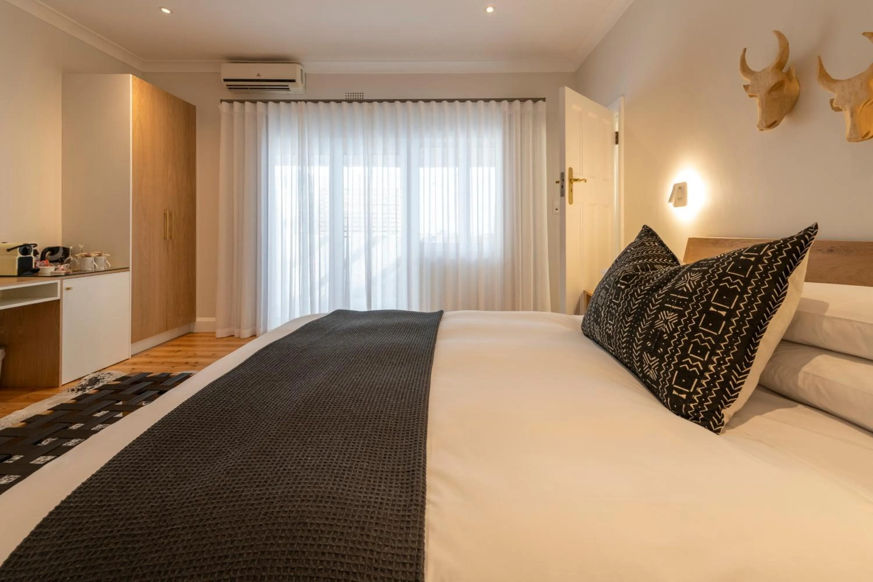 Bed in Hide-Away Guest House