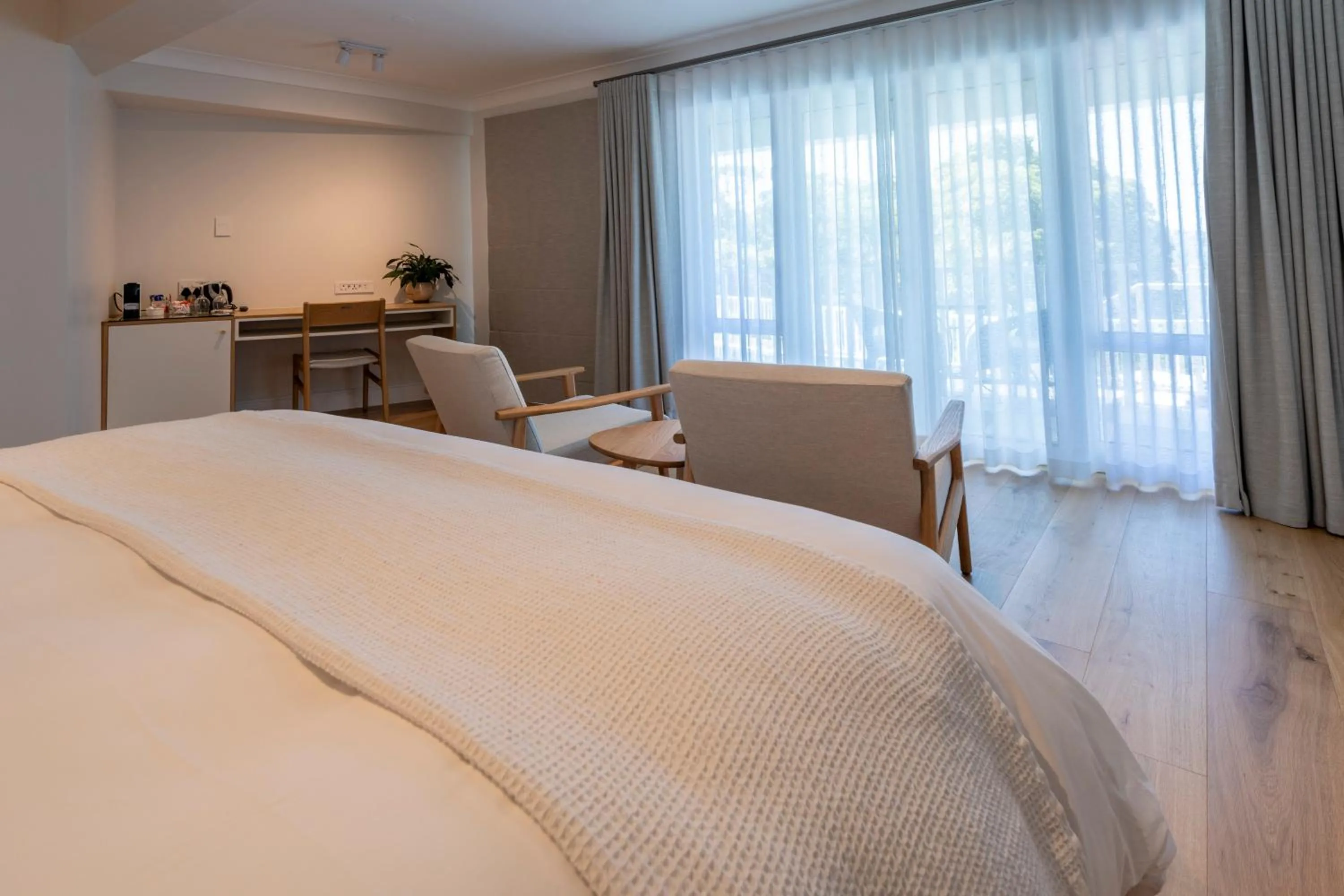 Bed in Hide-Away Guest House