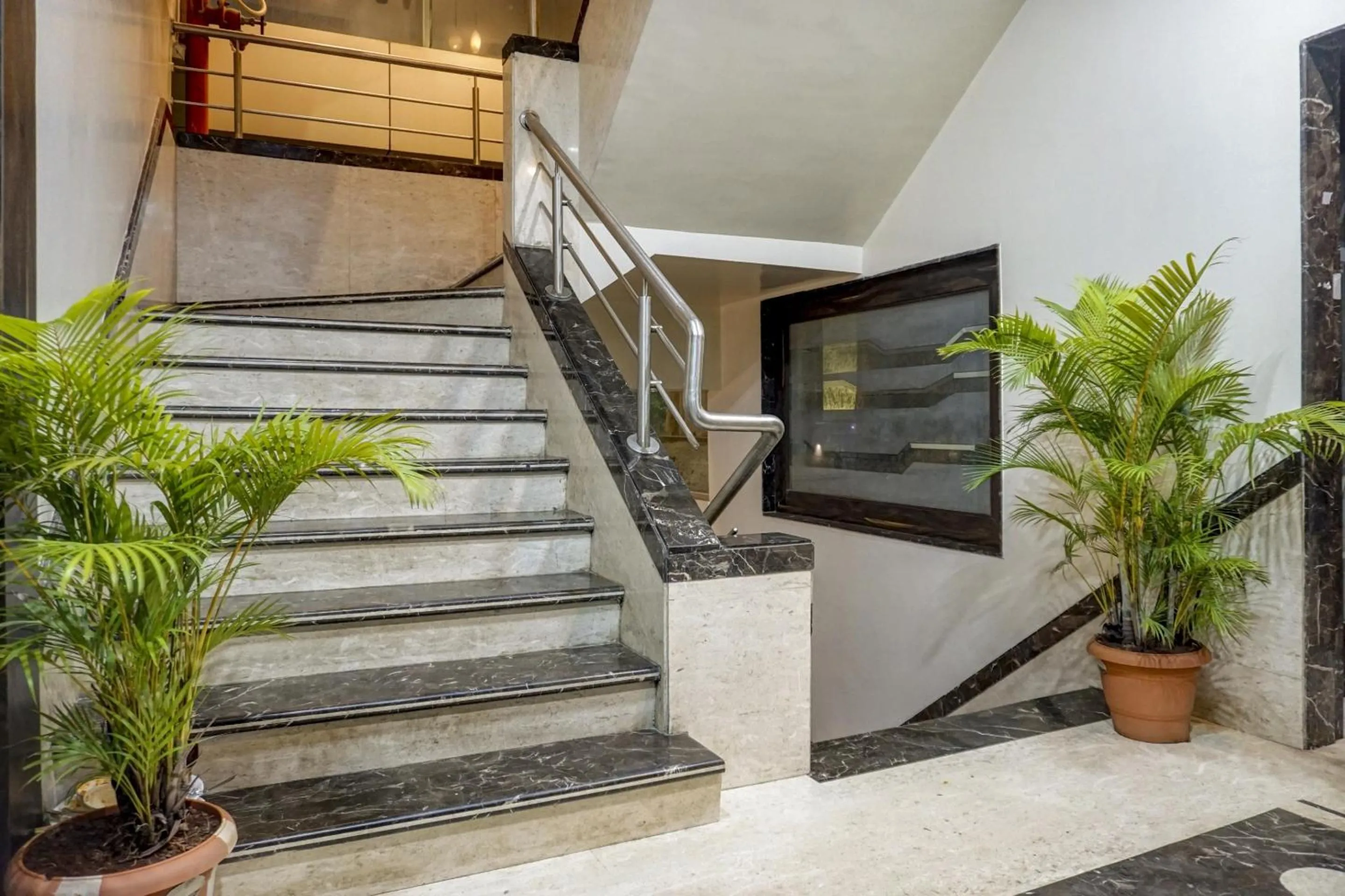 Lobby or reception in Super Townhouse OAK Regal Inn Near Sant Tukaram Nagar Metro Station