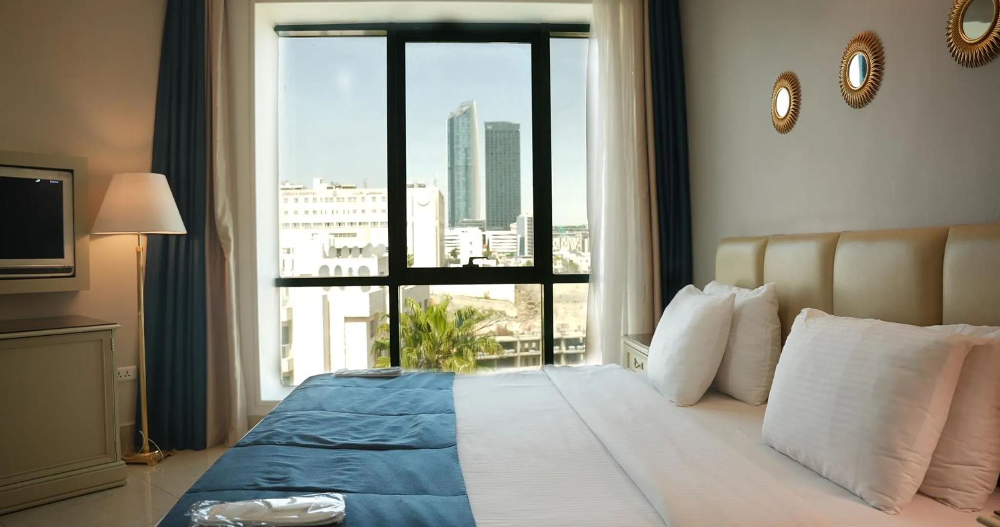 Communal lounge/ TV room, Bed in Amman West Luxury Hotel By Azar