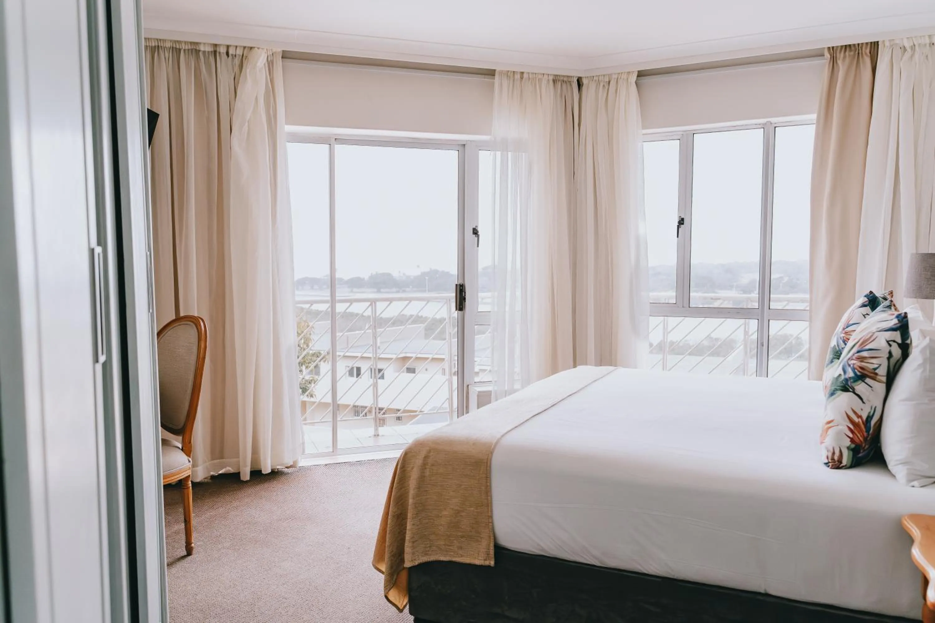 Bed in The Riverside Hotel