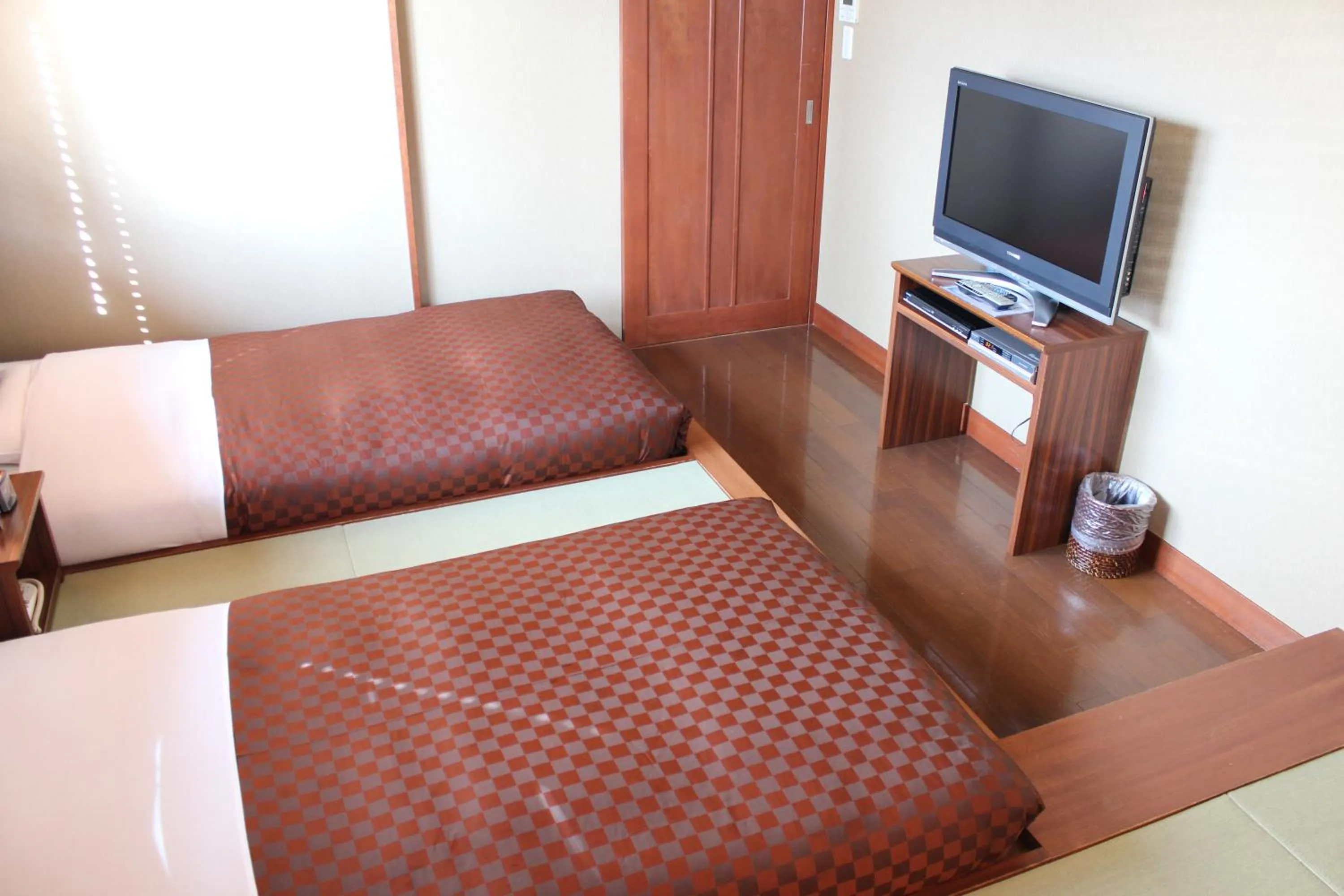 Photo of the whole room, Bed in Hotel Saika