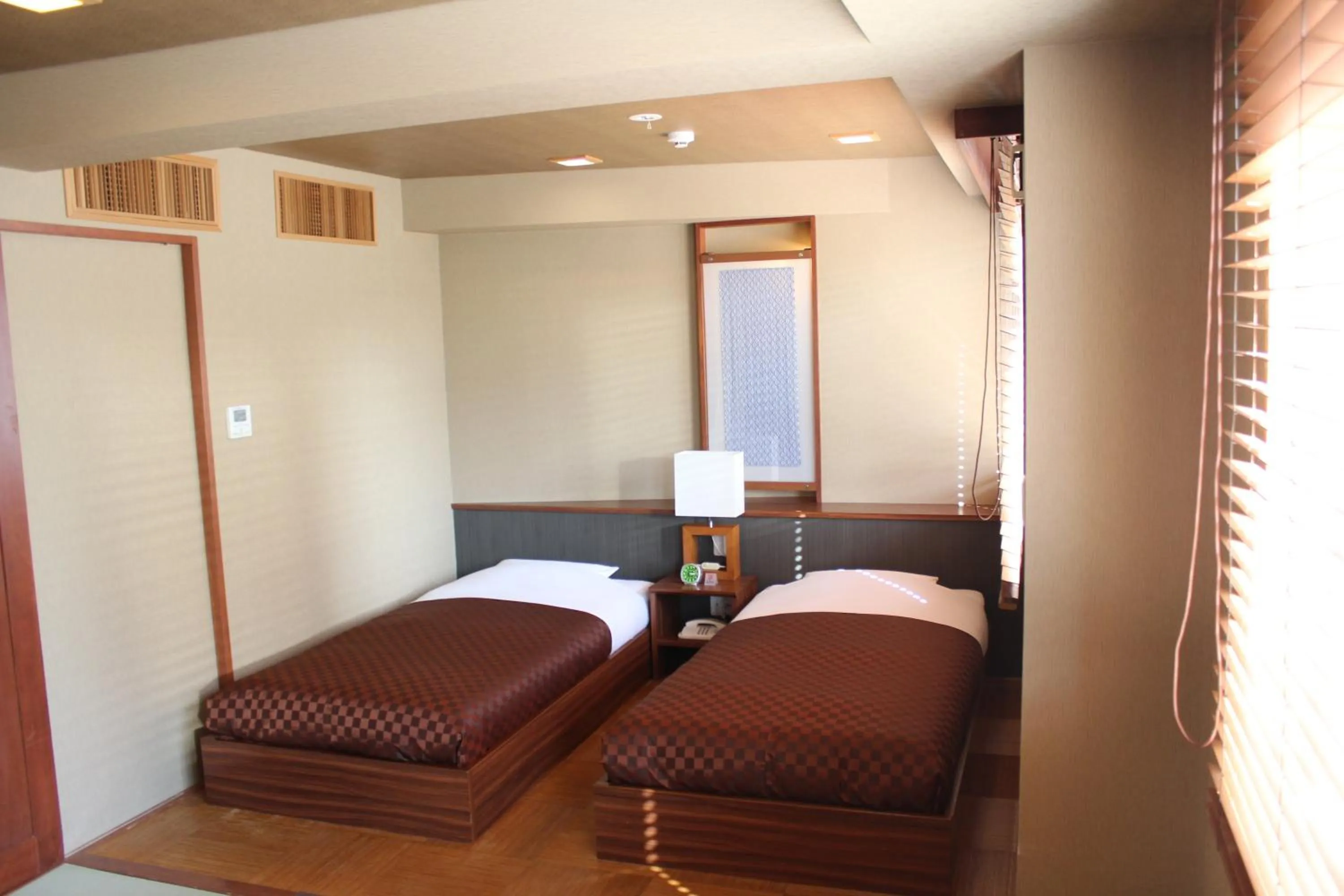 Photo of the whole room, Bed in Hotel Saika
