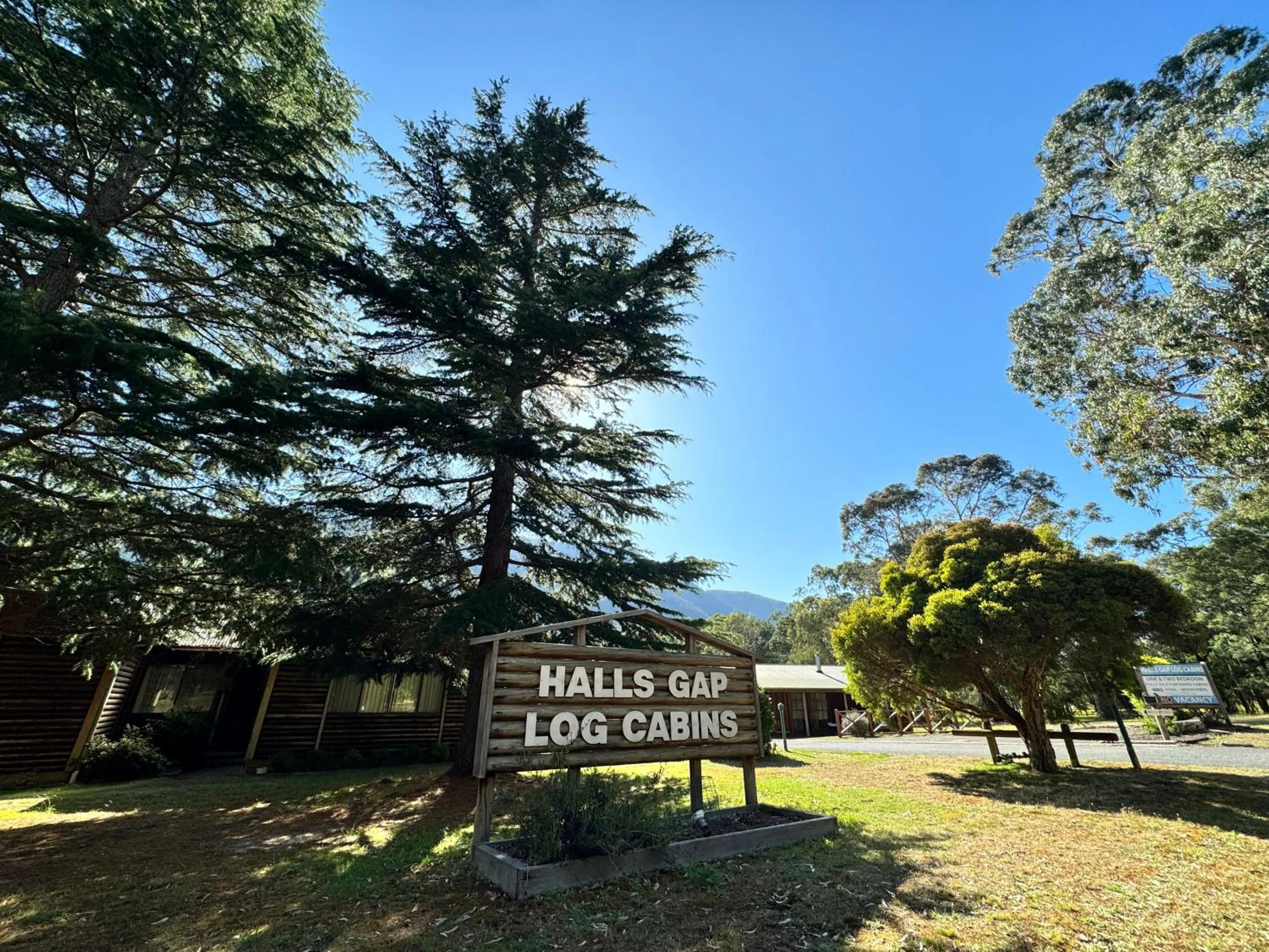 Property logo or sign in Halls Gap Log Cabins
