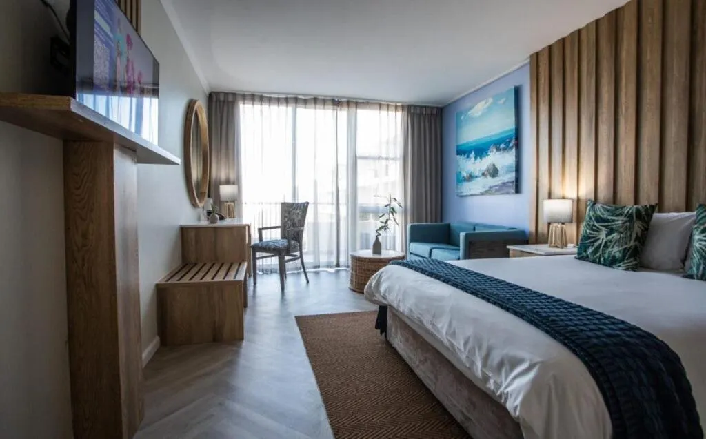 Bed in Lagoon Beach Hotel & Spa