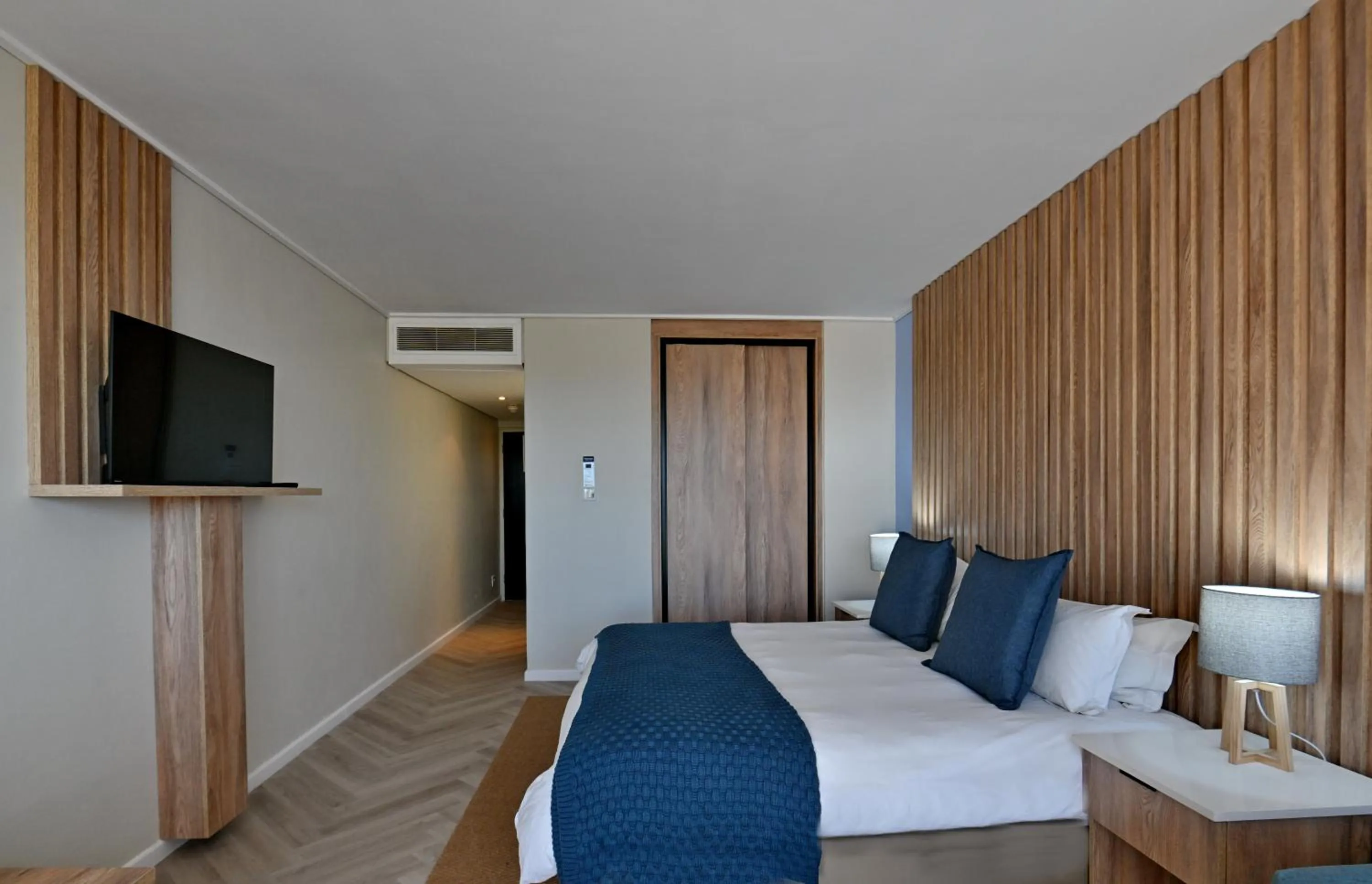 Bed in Lagoon Beach Hotel & Spa