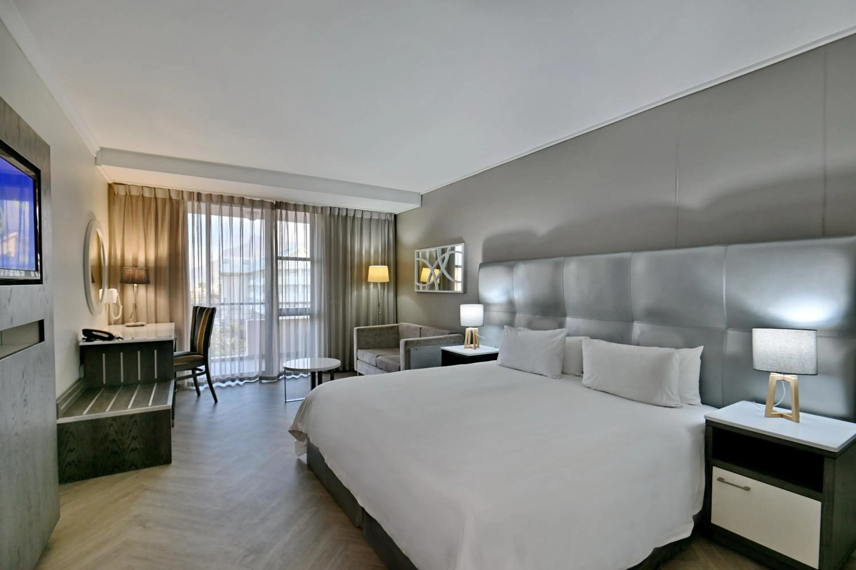 Photo of the whole room, Bed in Lagoon Beach Hotel & Spa