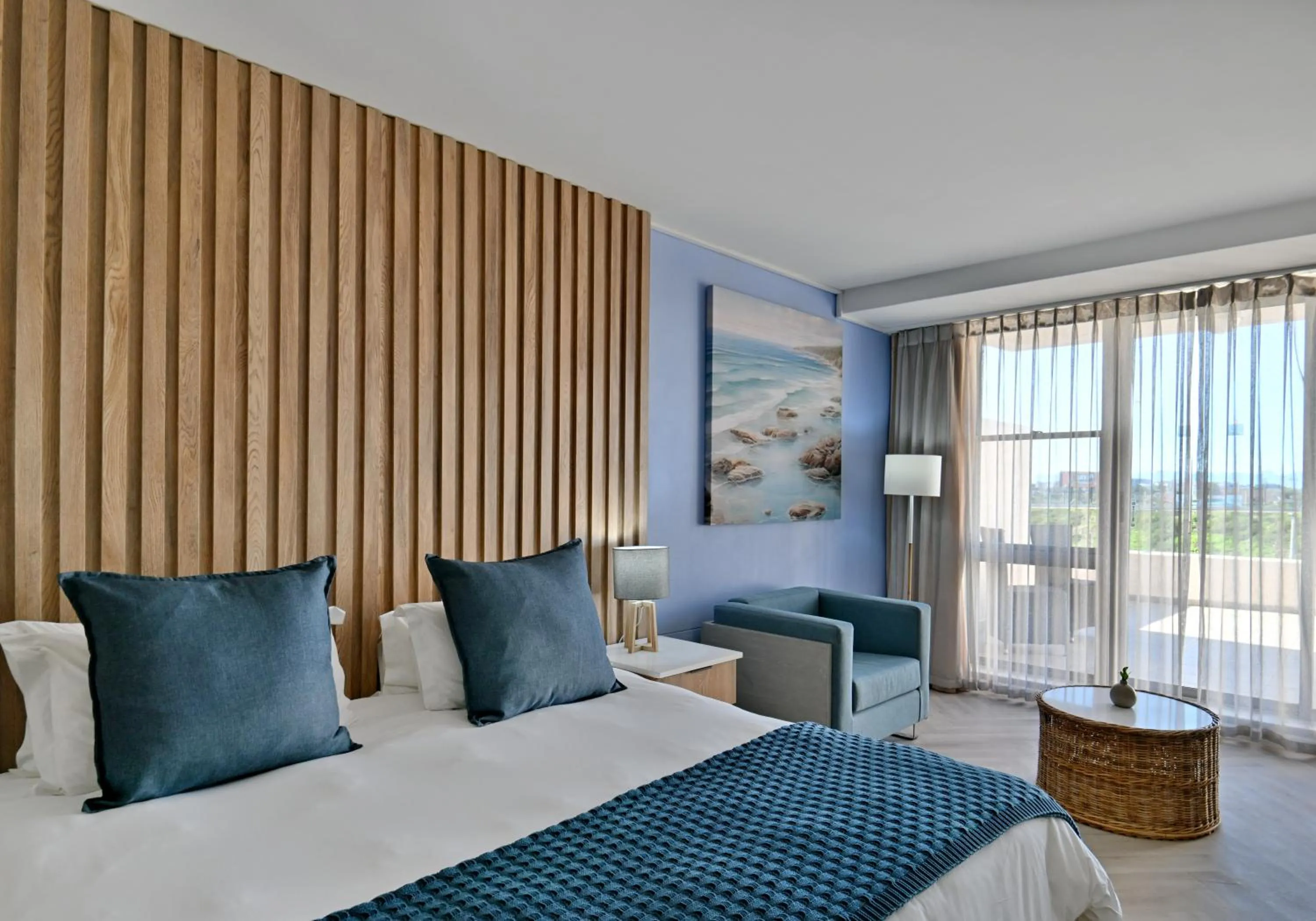 Bed in Lagoon Beach Hotel & Spa