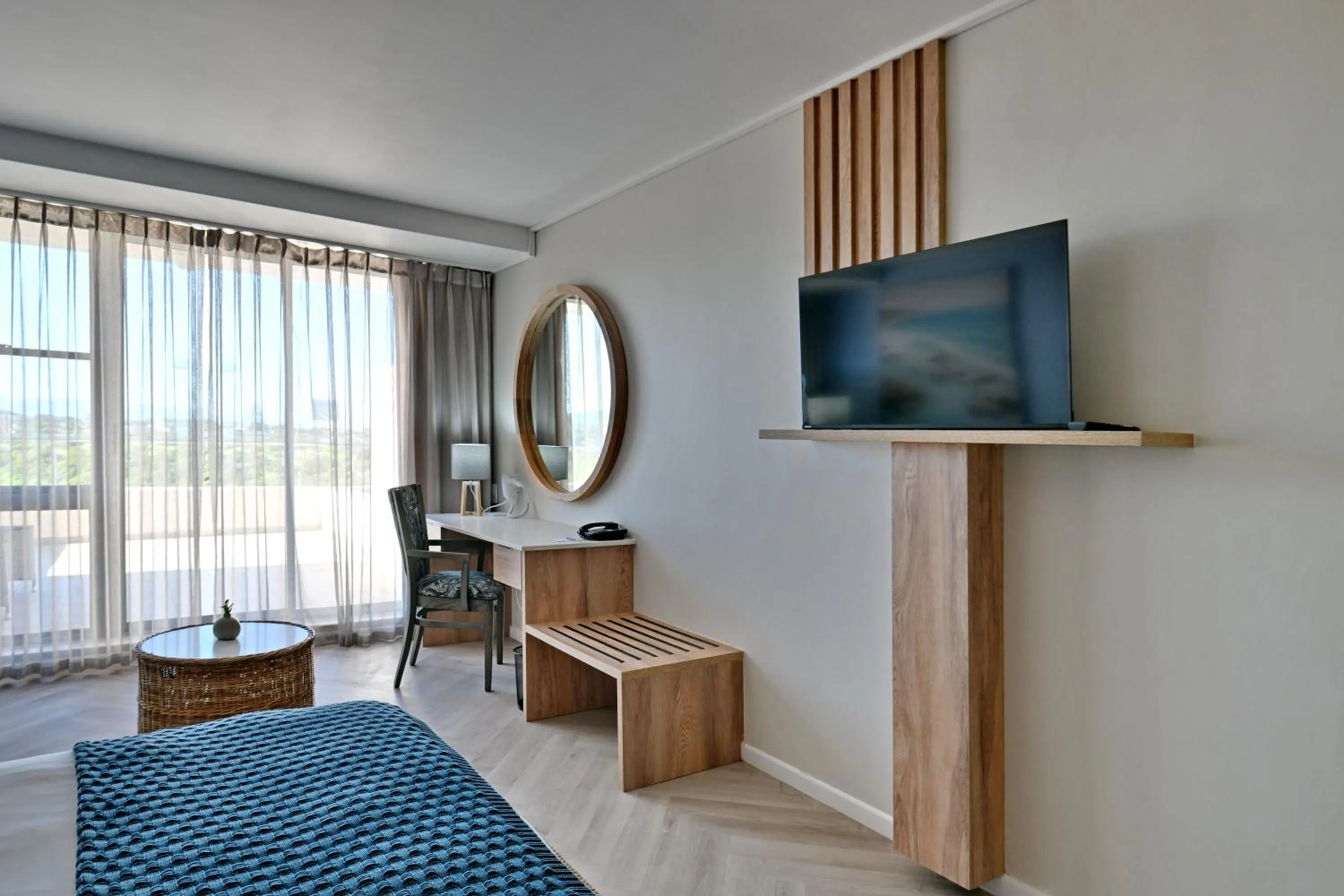 Bed in Lagoon Beach Hotel & Spa