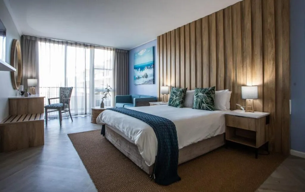 Bed in Lagoon Beach Hotel & Spa