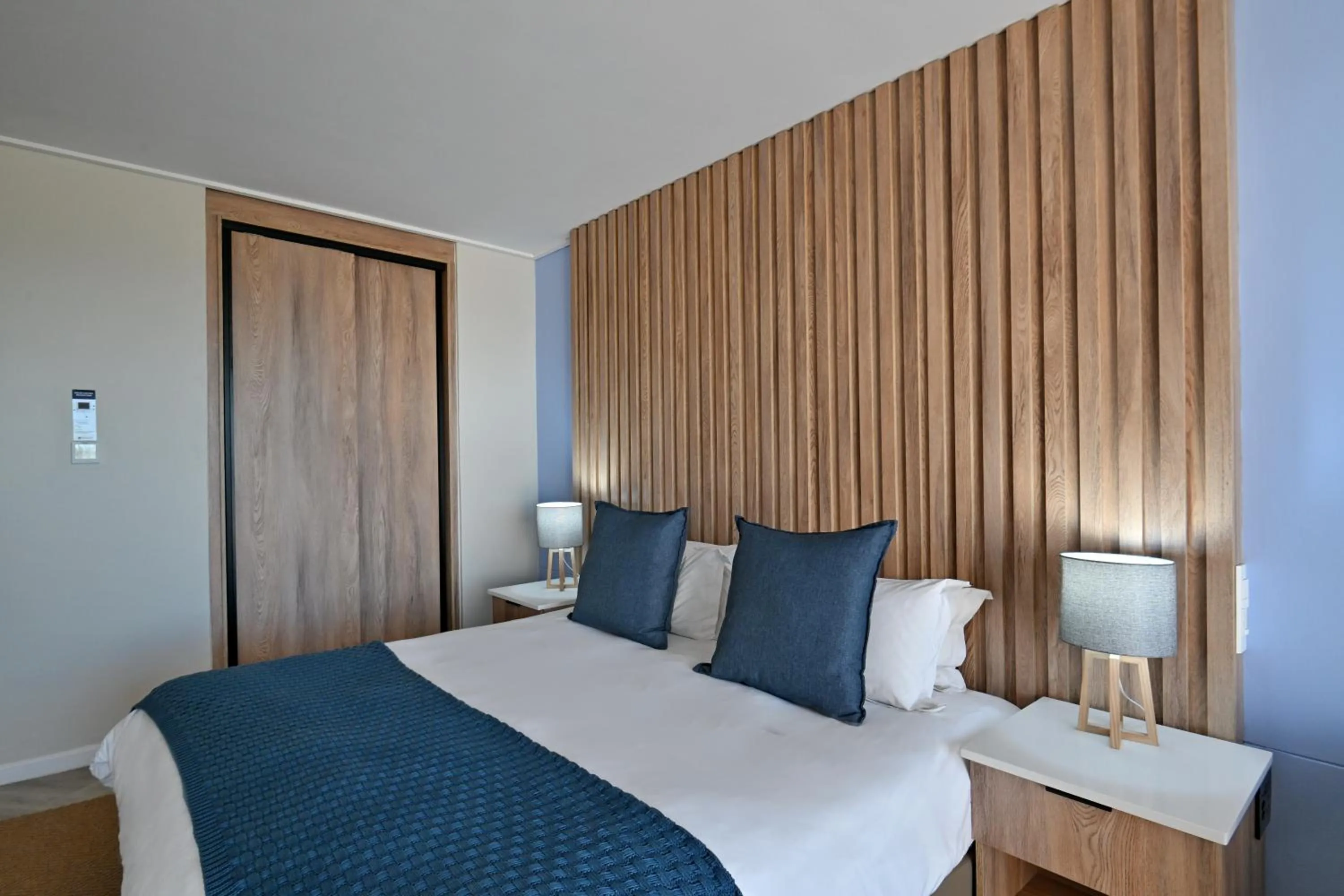 Bed in Lagoon Beach Hotel & Spa