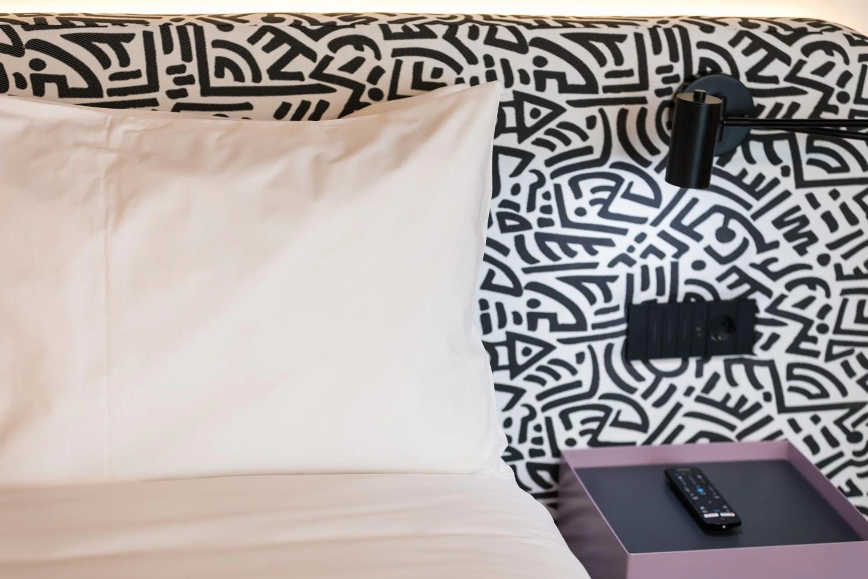 Bed in Mercure Bucharest Cantemir