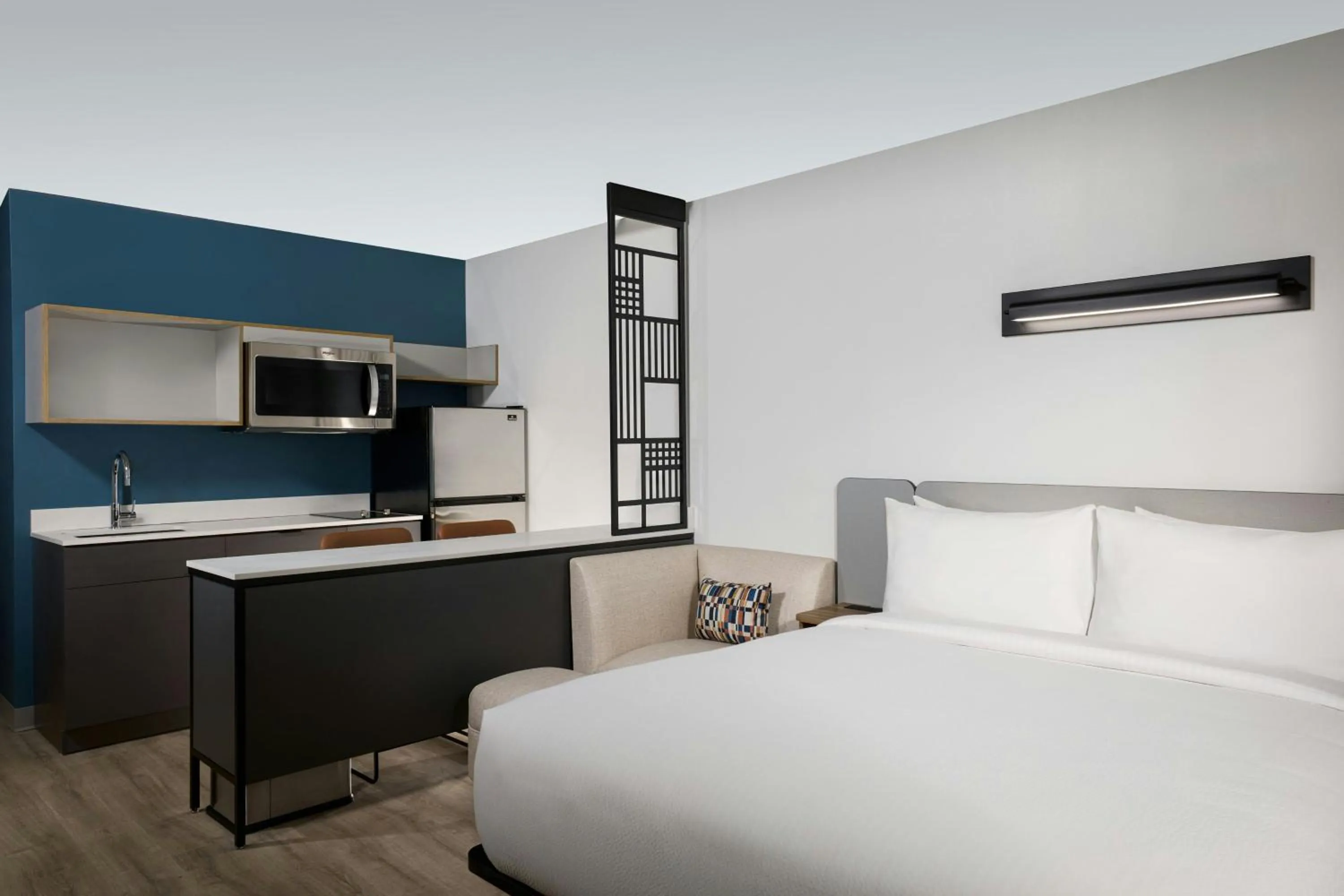 Kitchen or kitchenette, Bed in StudioRes by Marriott Jacksonville Orange Park