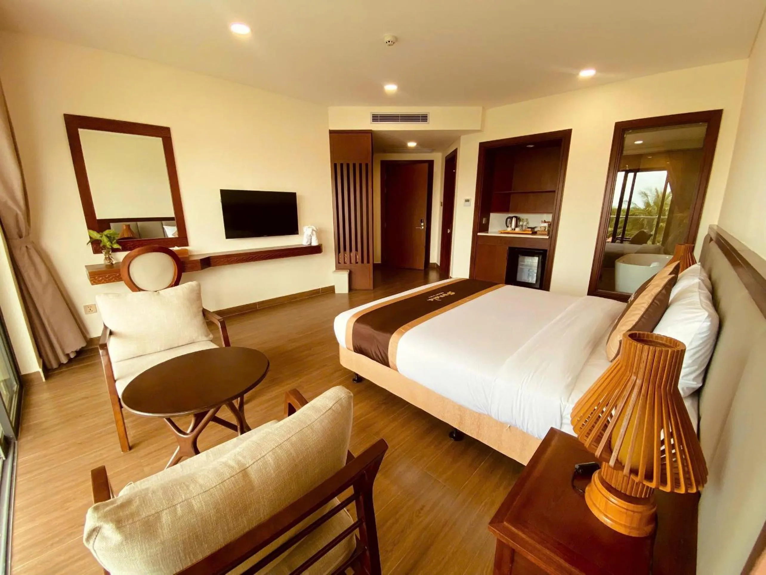 Bed in Sonata Resort & Spa