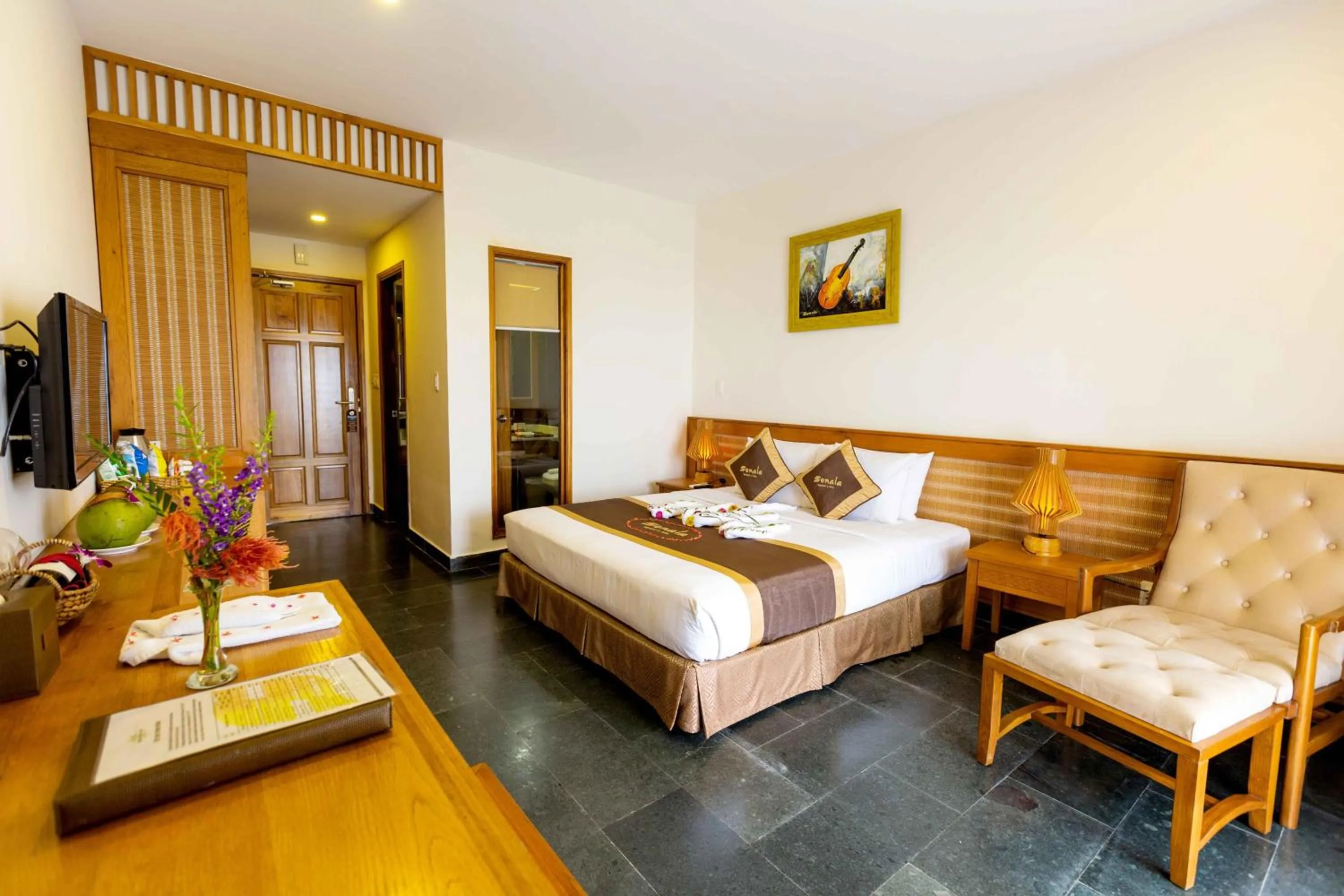 Bed in Sonata Resort & Spa