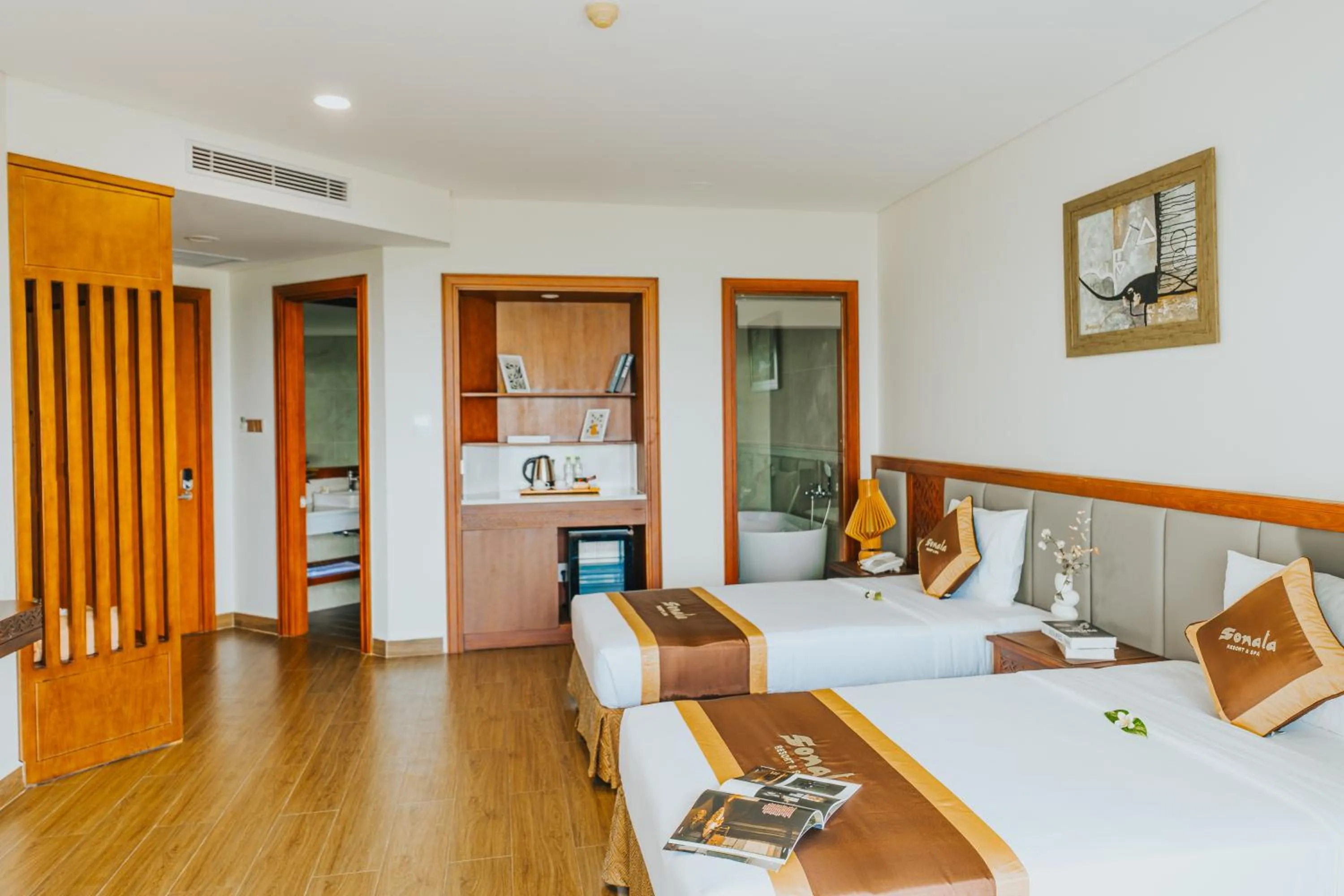 Bed in Sonata Resort & Spa