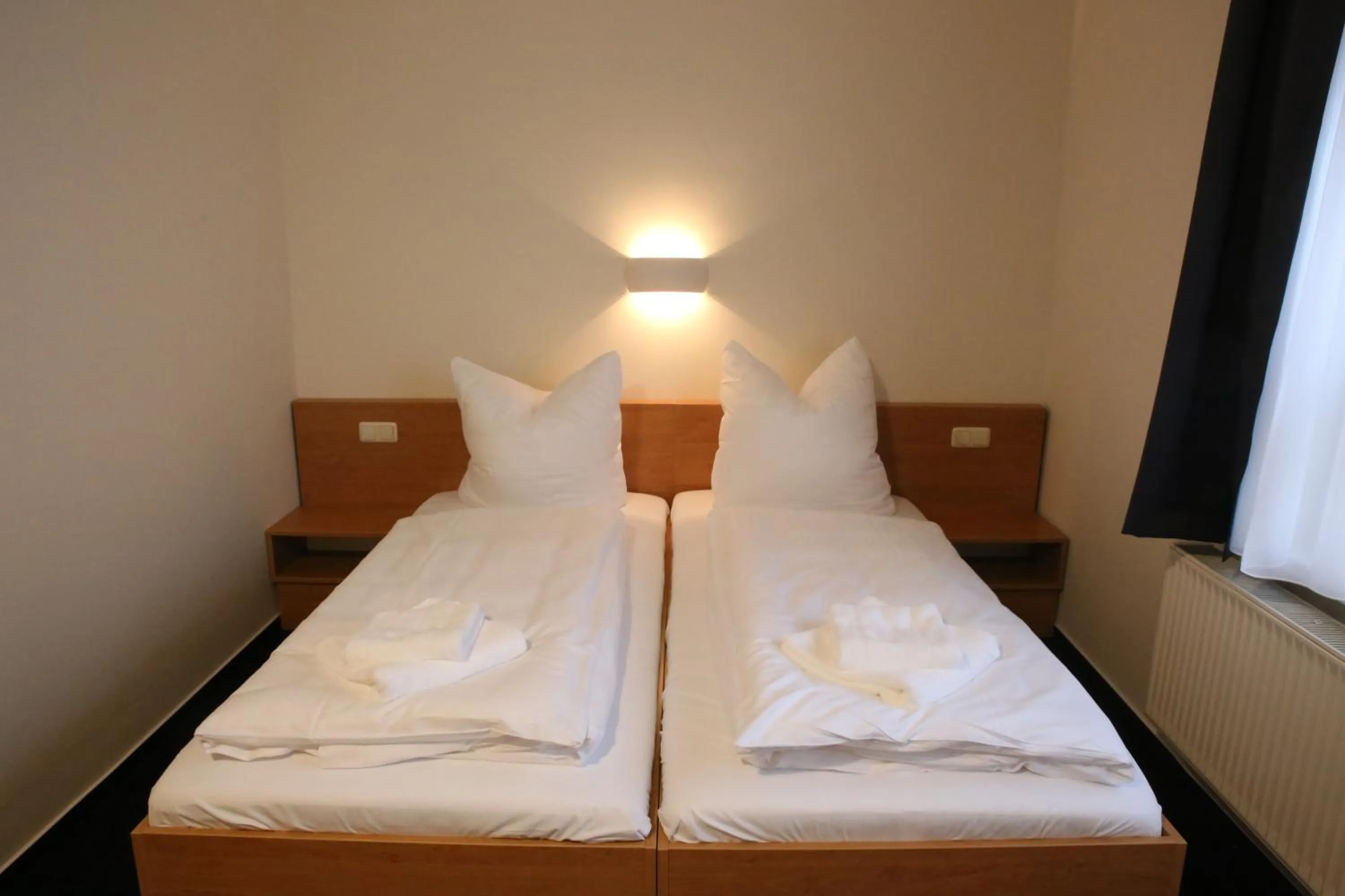 Photo of the whole room, Bed in City-Pension Magdeburg