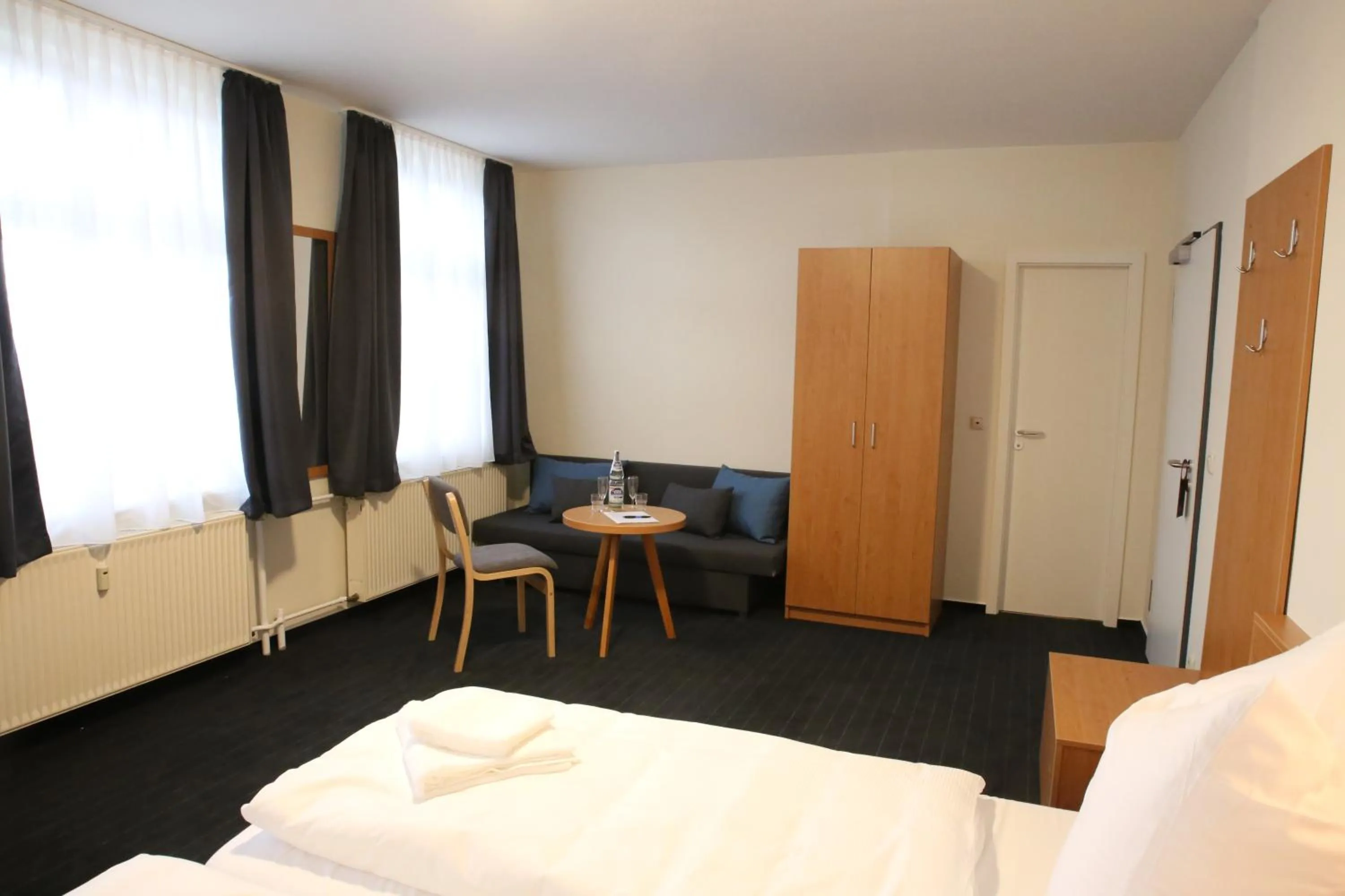 Photo of the whole room, Bed in City-Pension Magdeburg