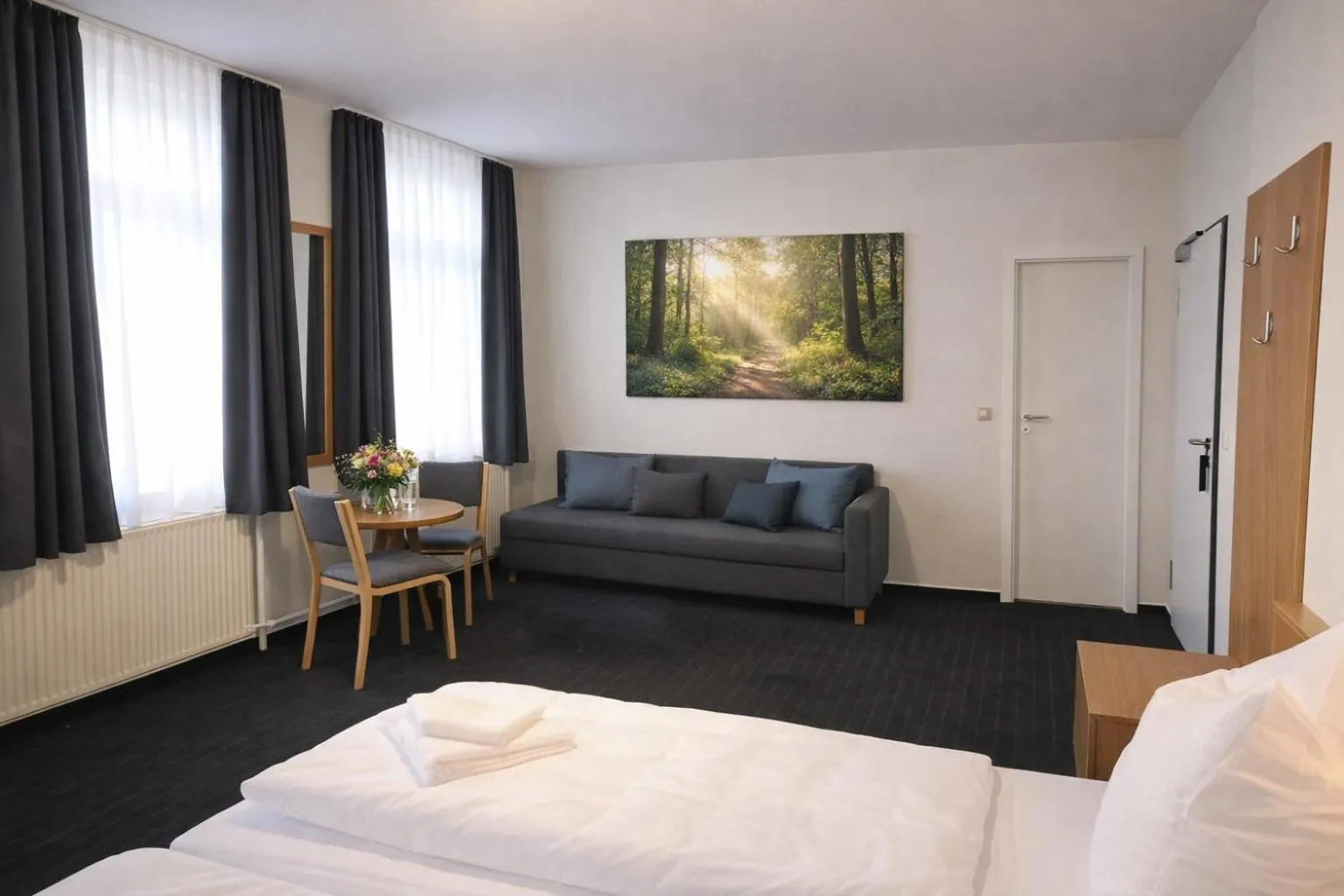 Photo of the whole room, Bed in City-Pension Magdeburg