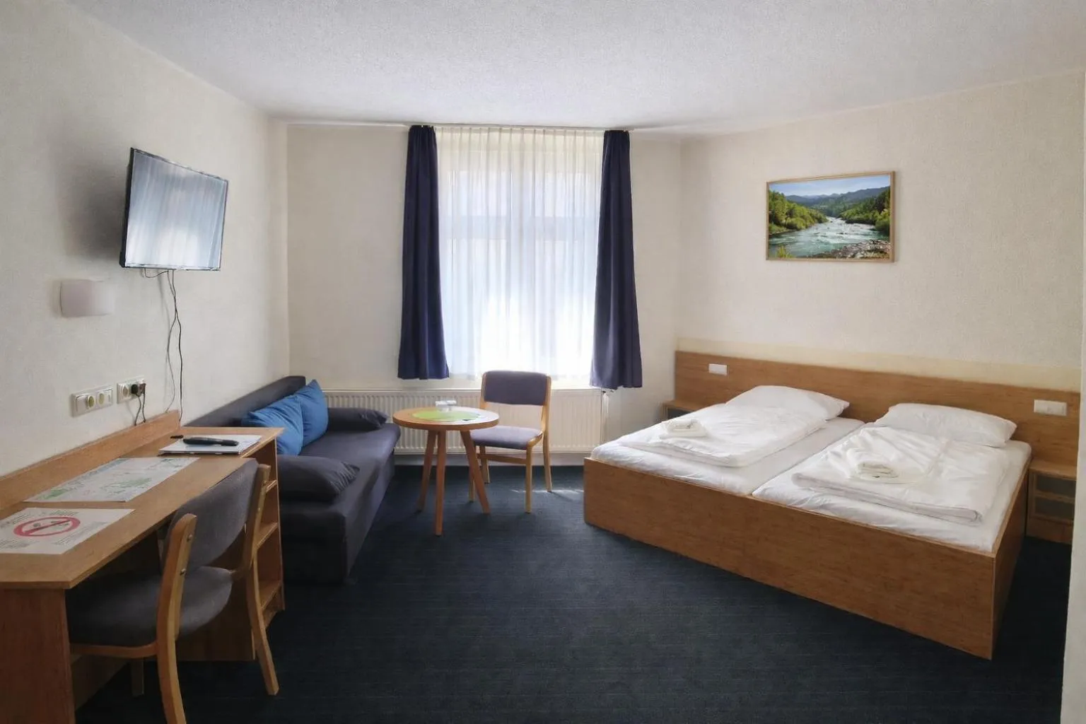 Bed in City-Pension Magdeburg