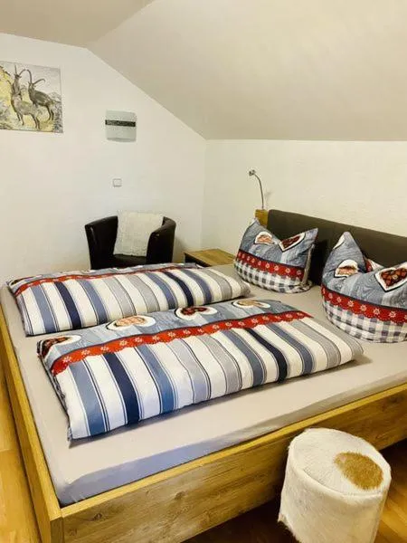 Bed in Steinbock Bed & Breakfast