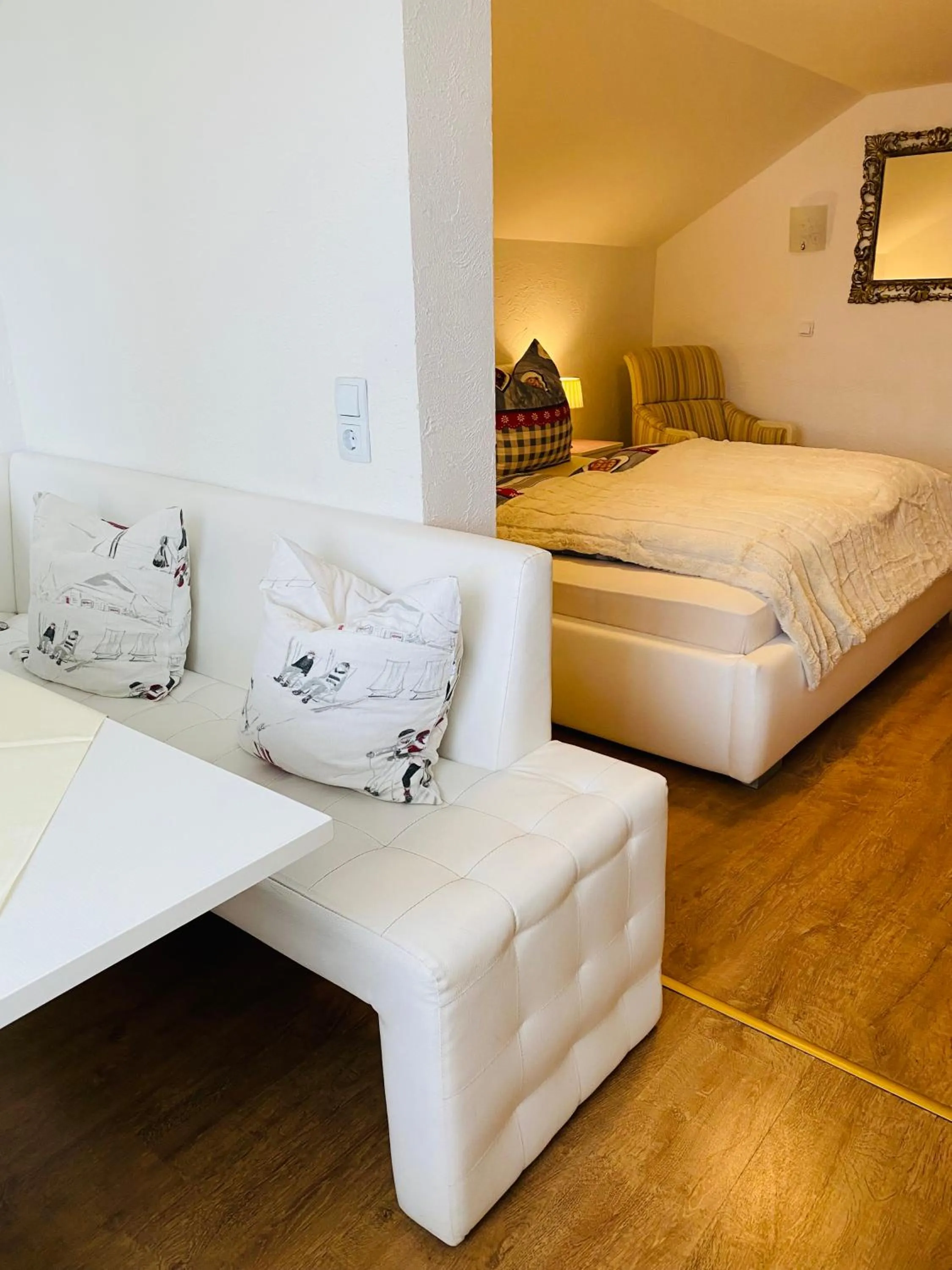 Seating area, Bed in Steinbock Bed & Breakfast