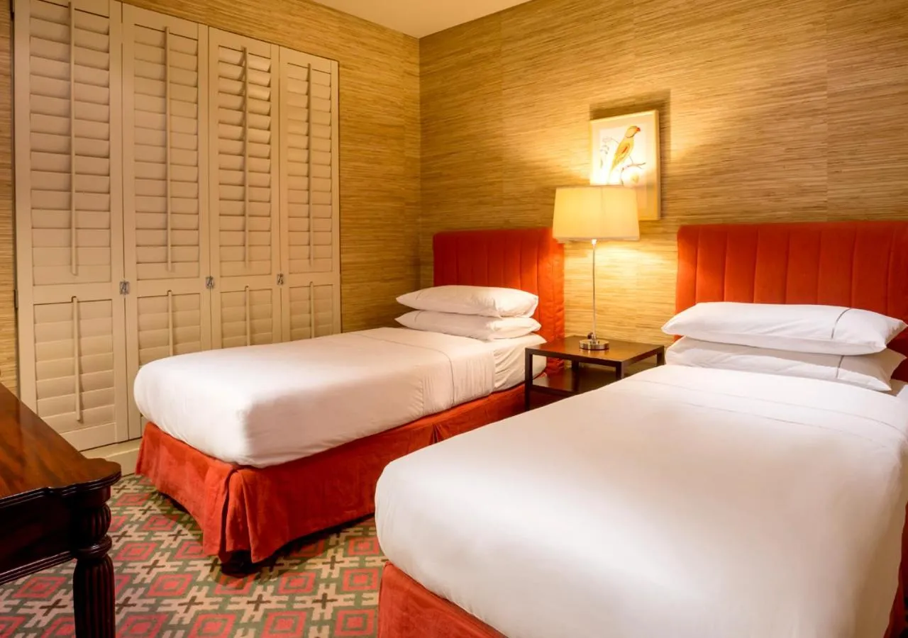 Bed in Royal Palm Hotel