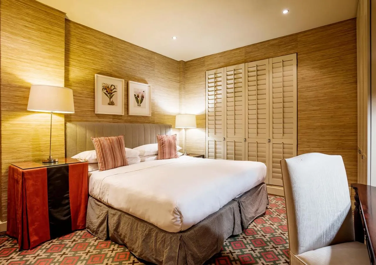 Bed in Royal Palm Hotel