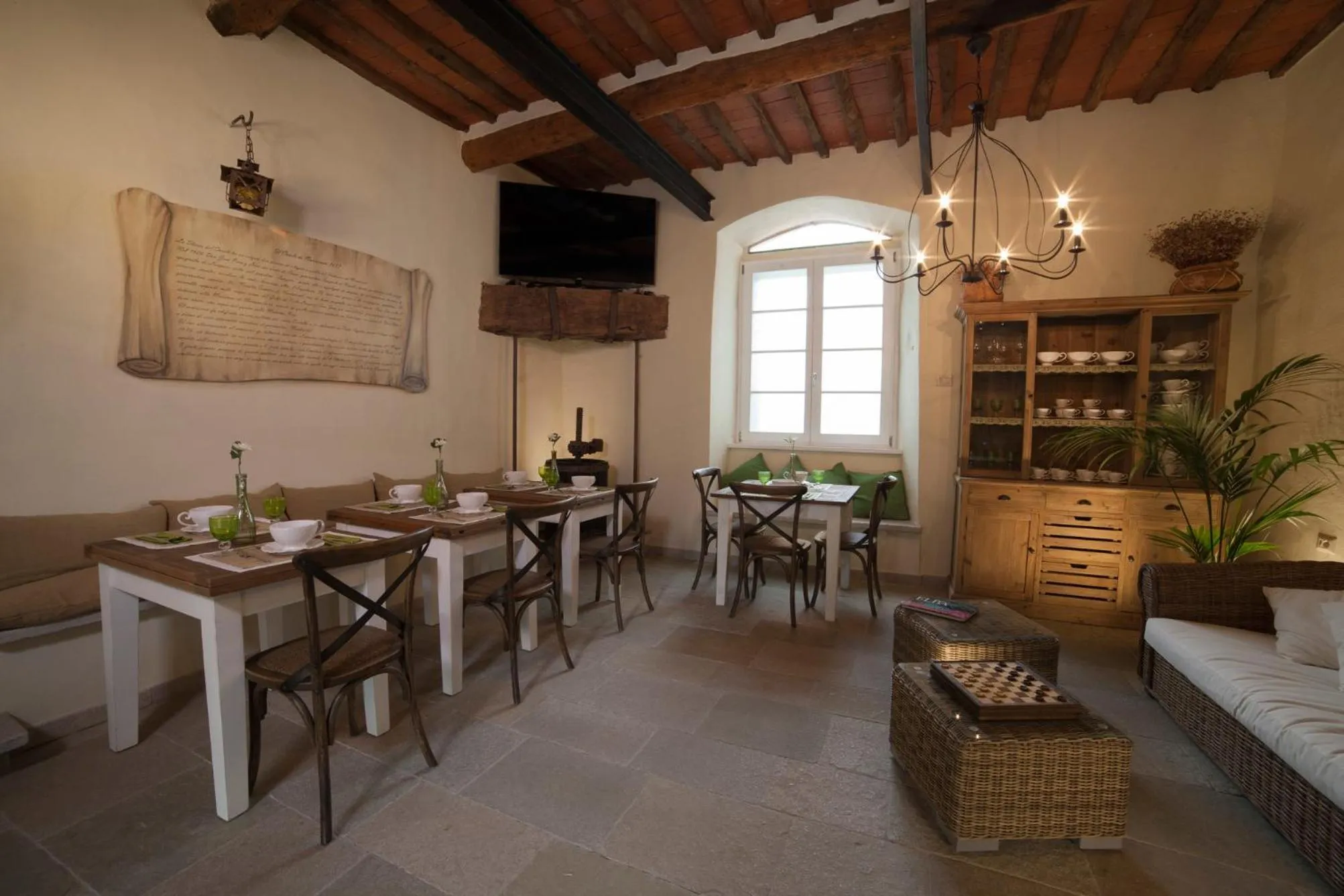 Communal lounge/ TV room in B&B Il Casale di Monserrato