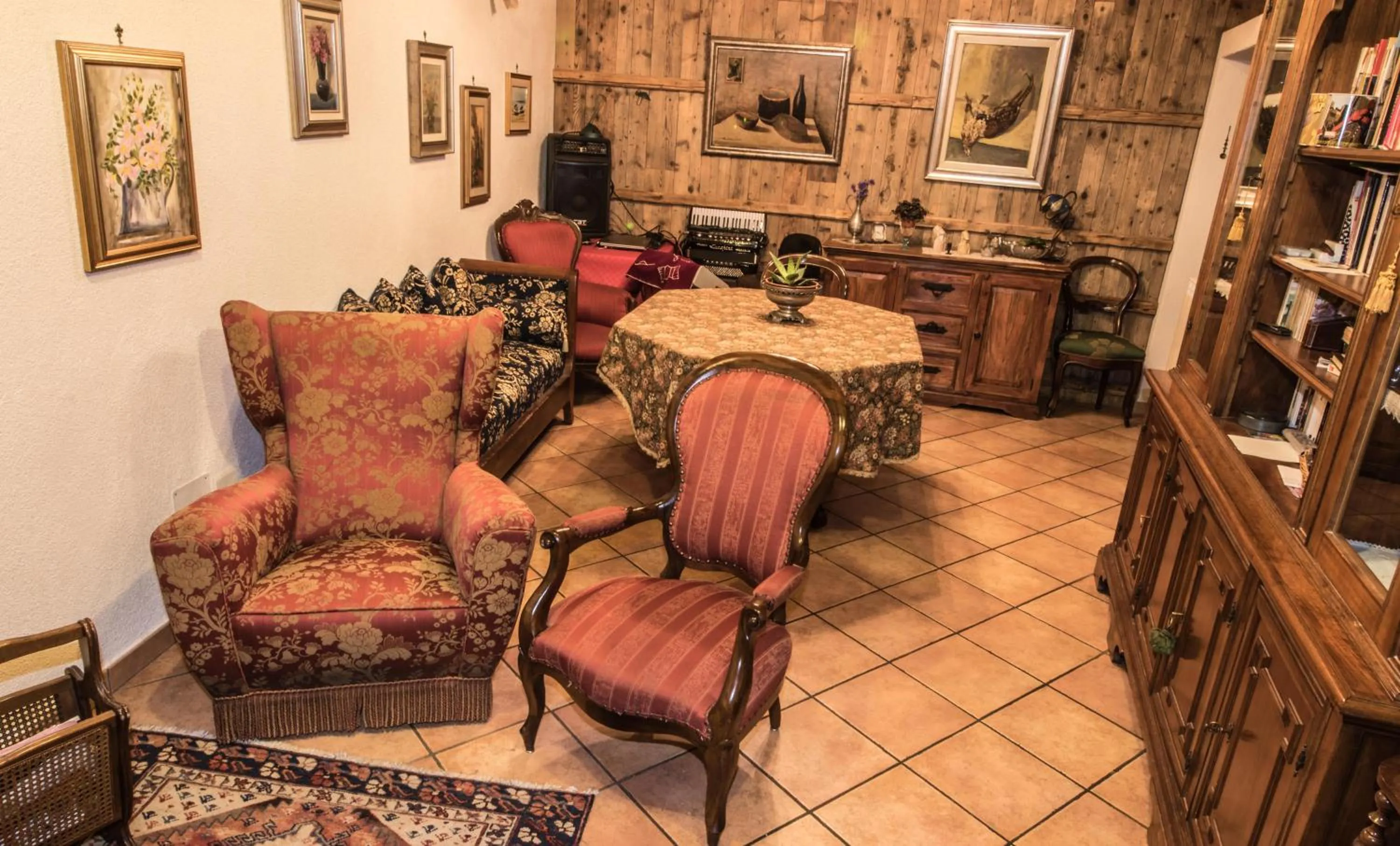 Communal lounge/ TV room in B&B Casa Mia