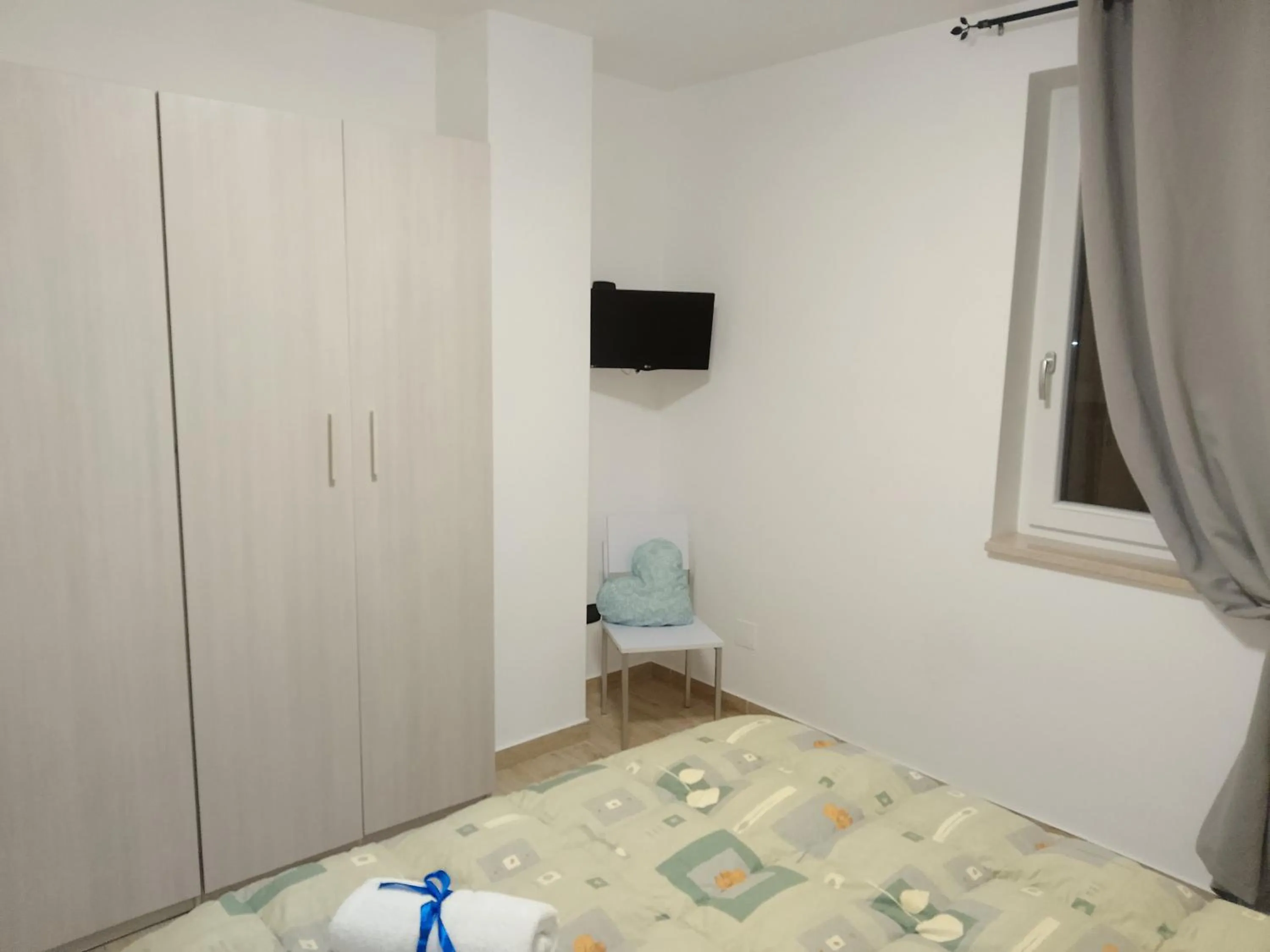 Bed in Art Village Residence