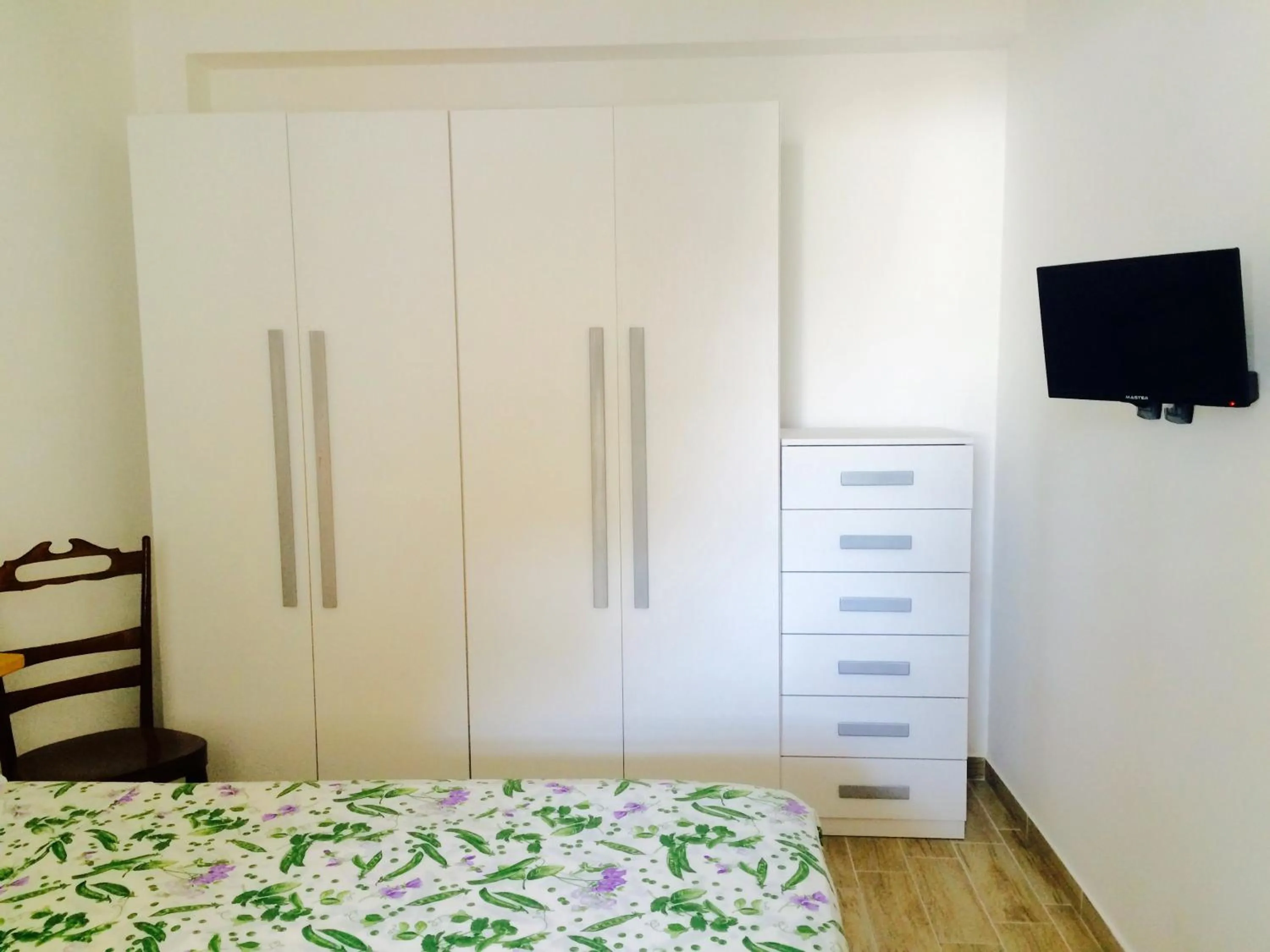 Bed in Art Village Residence