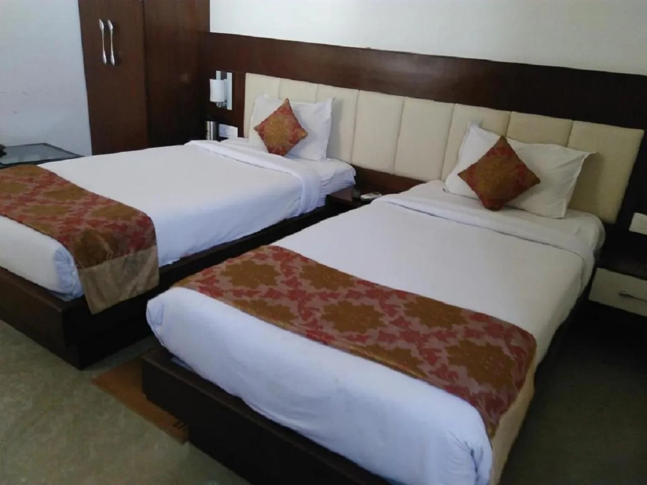 Photo of the whole room, Bed in Hotel Taj Heights