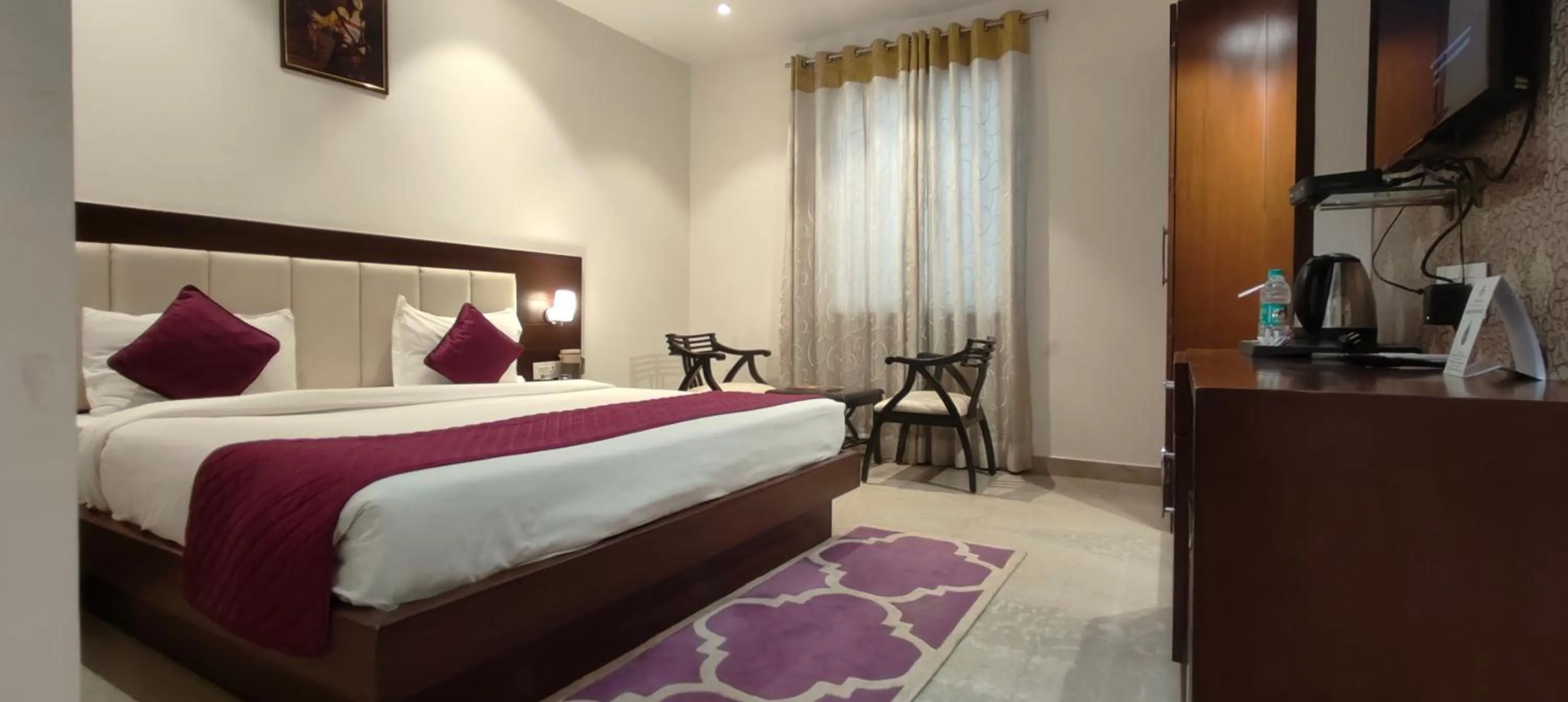 Bed in Hotel Taj Heights