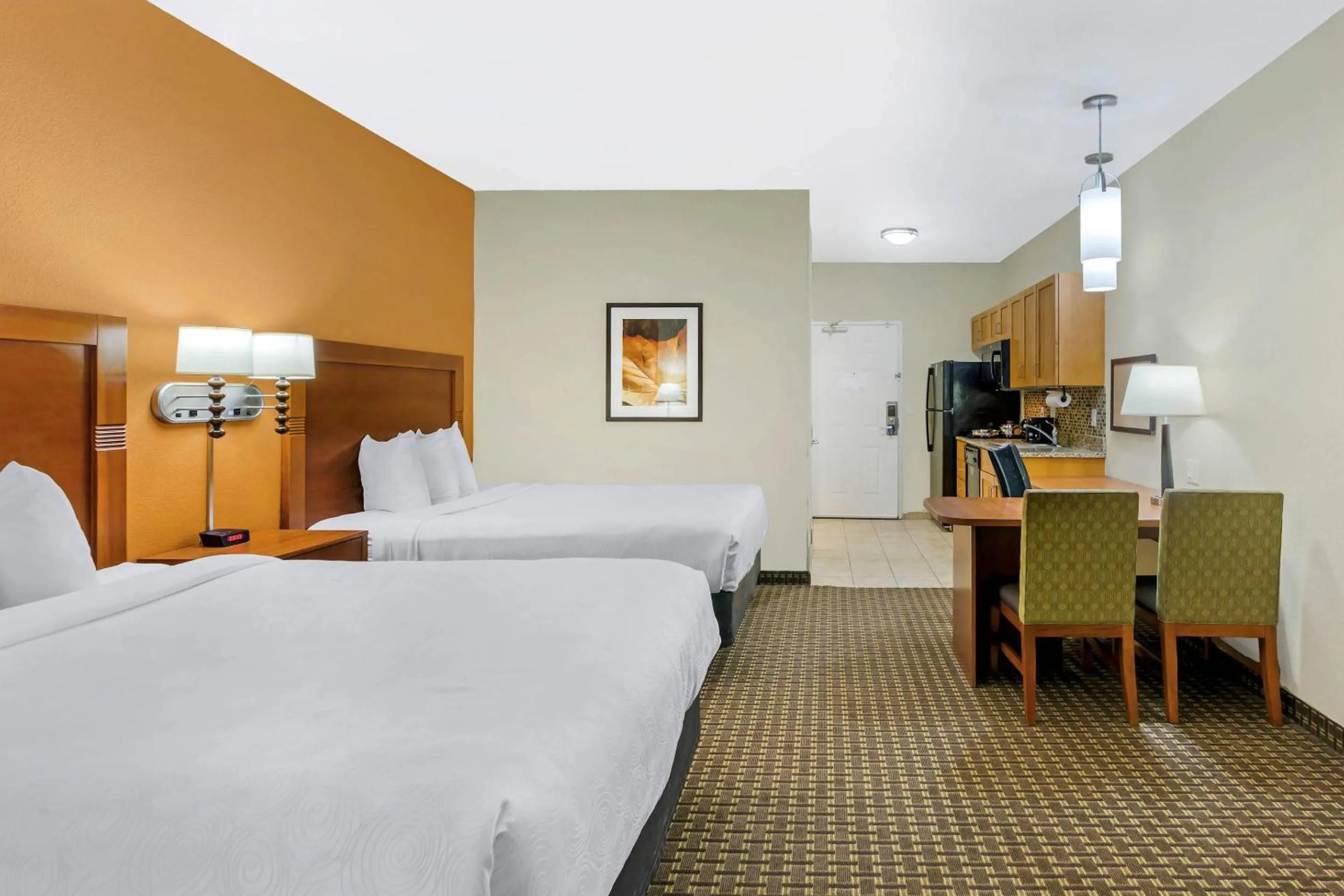 Bedroom, Bed in MainStay Suites Stanley