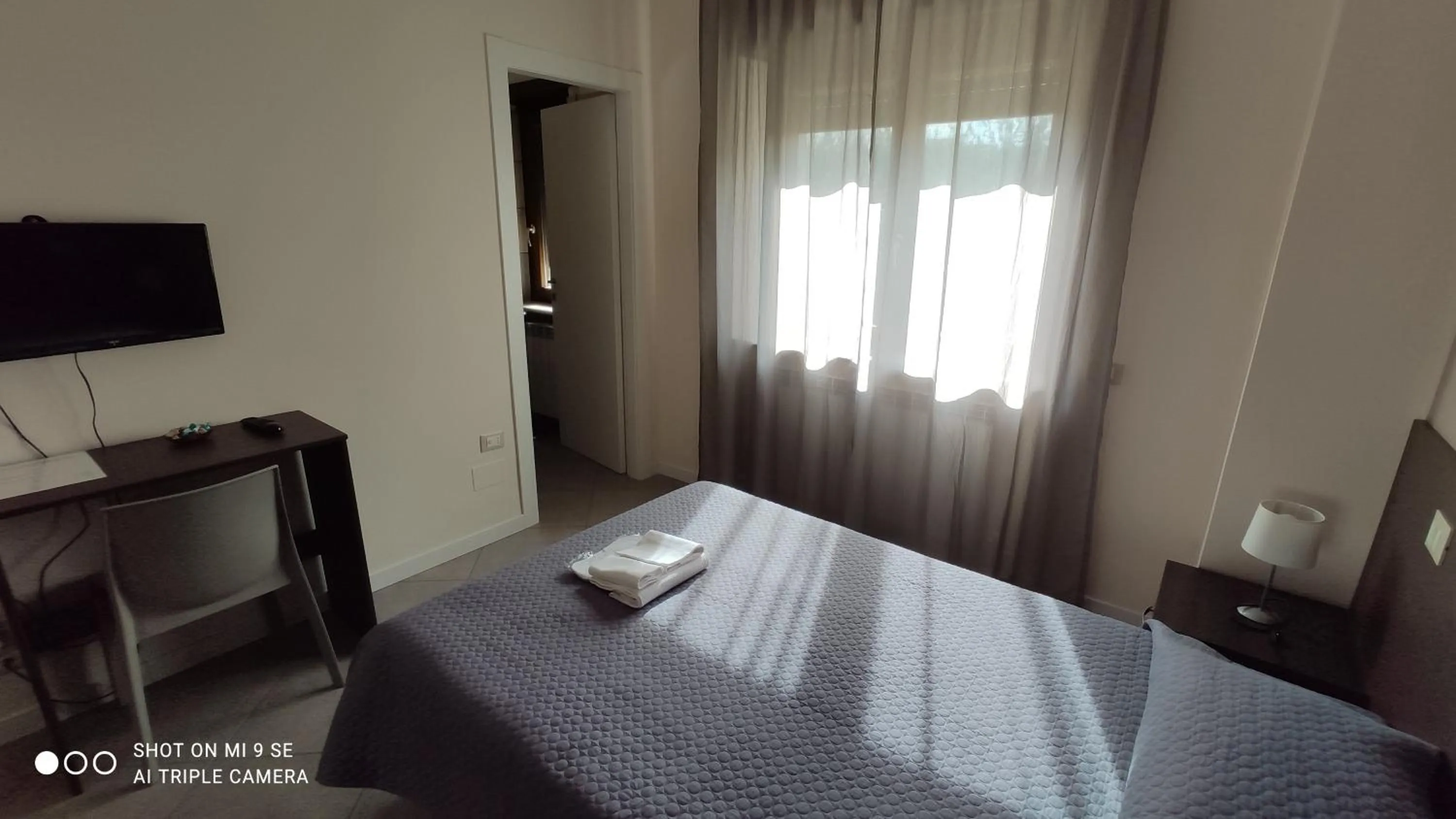 Bed in B&B Grandangolo