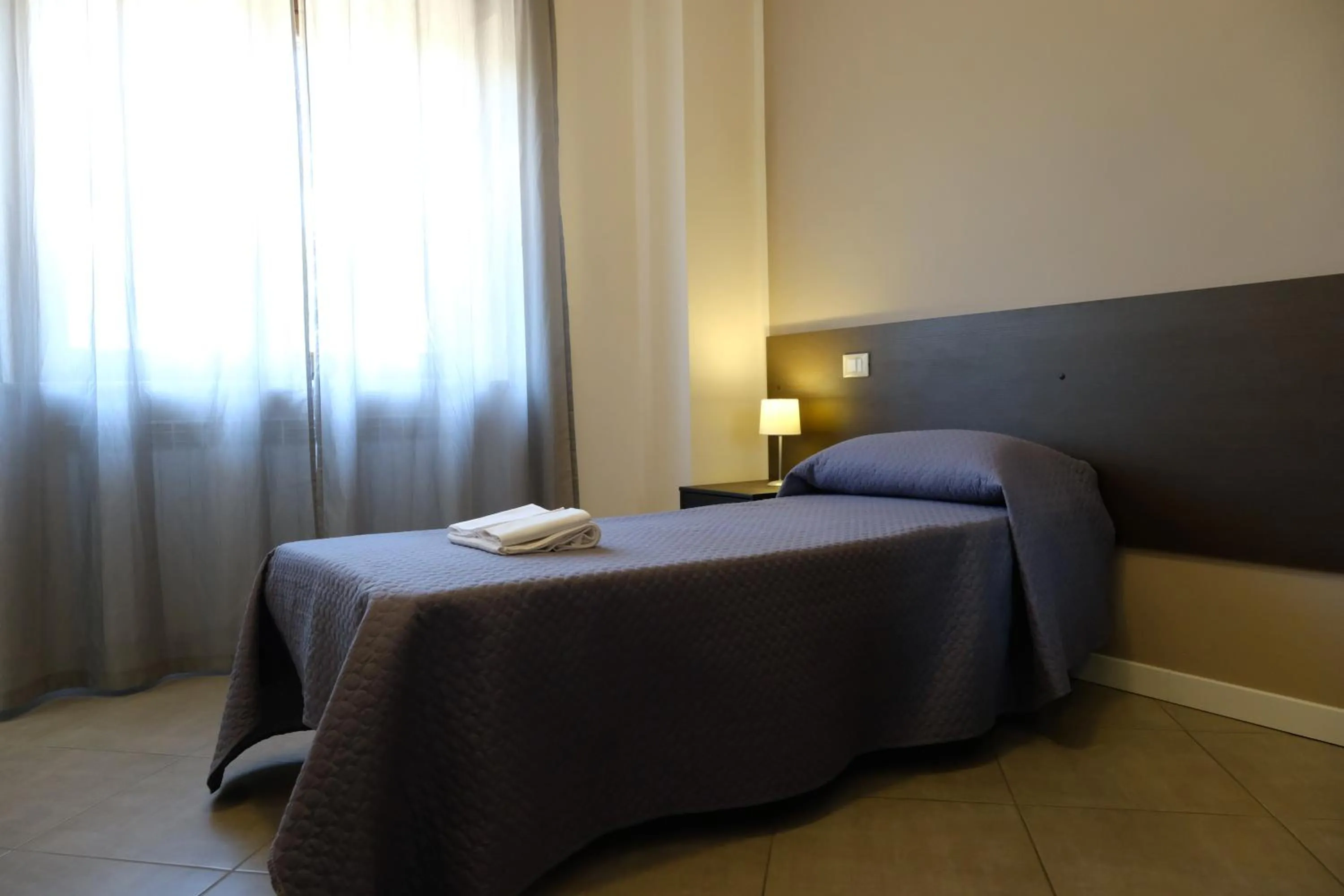 Bed in B&B Grandangolo