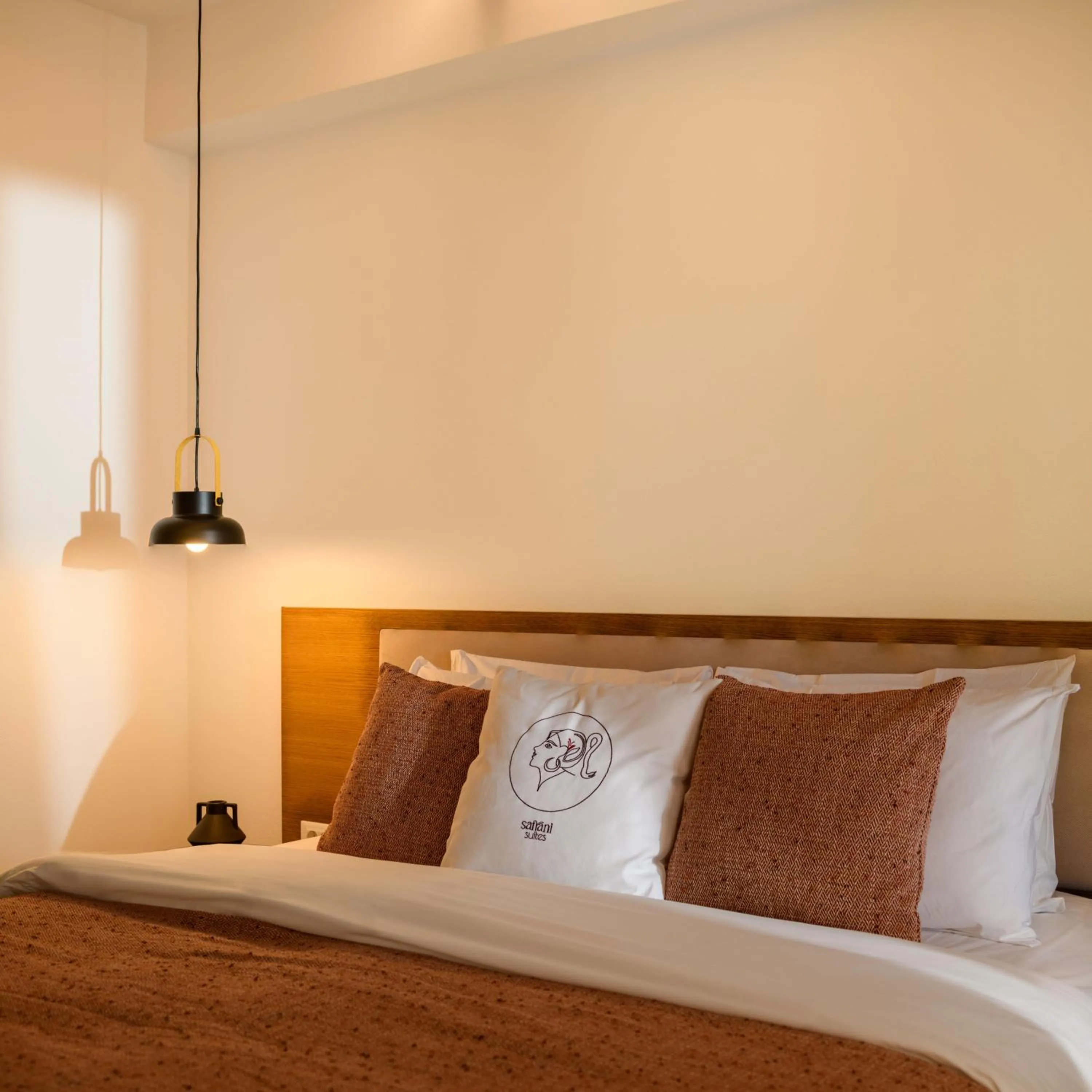 Bed in Safrani Suites