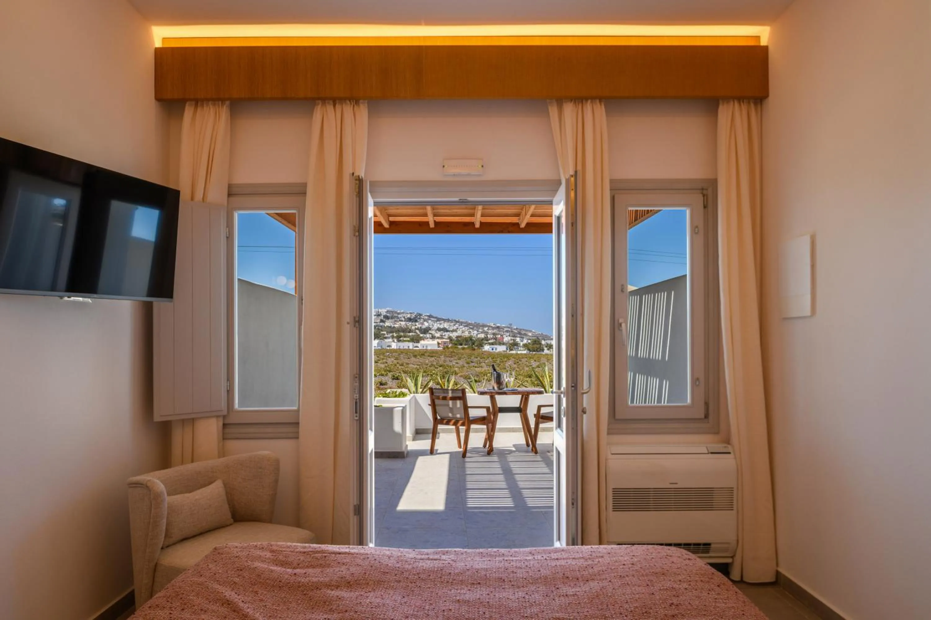 Bed in Safrani Suites