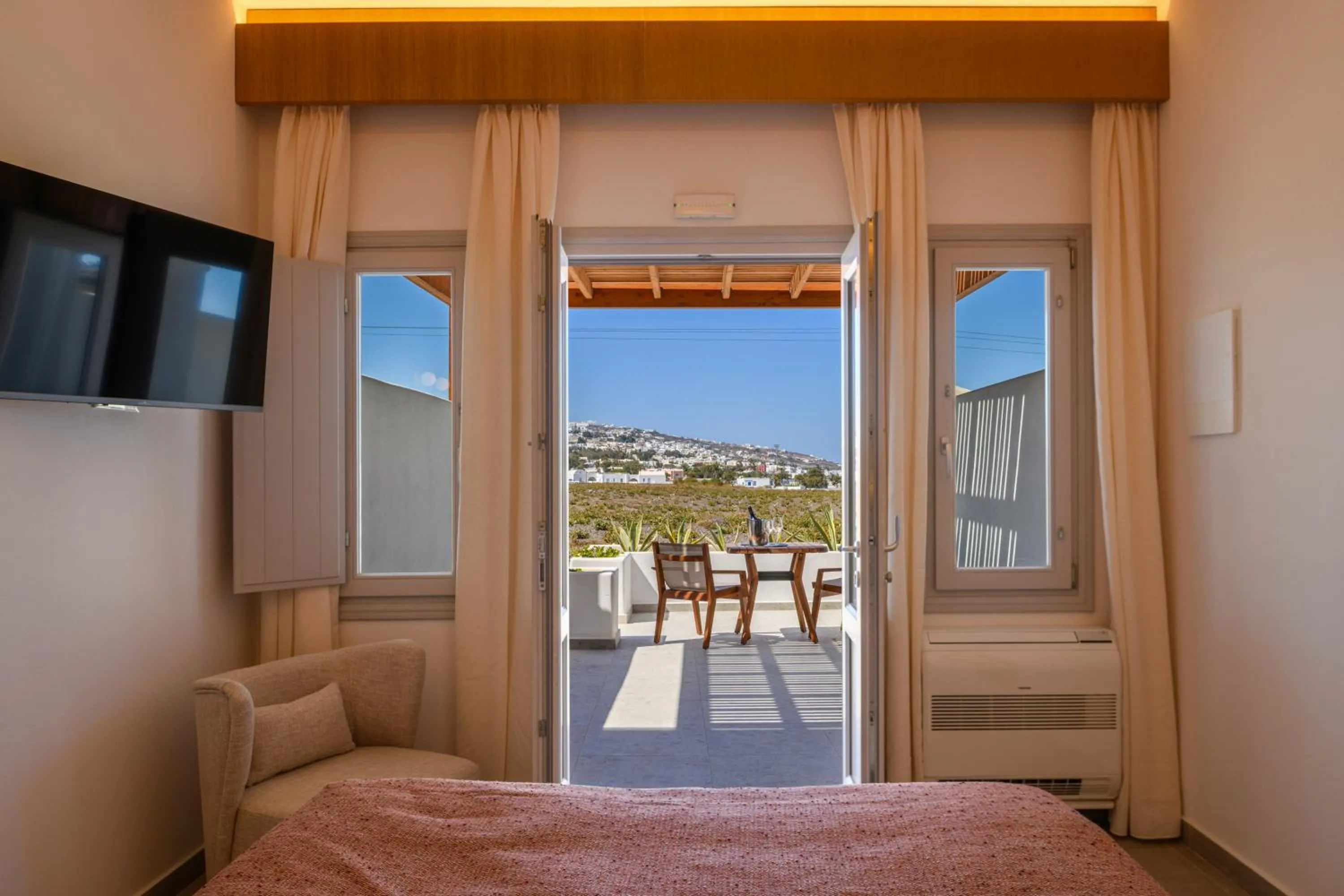 Bed in Safrani Suites